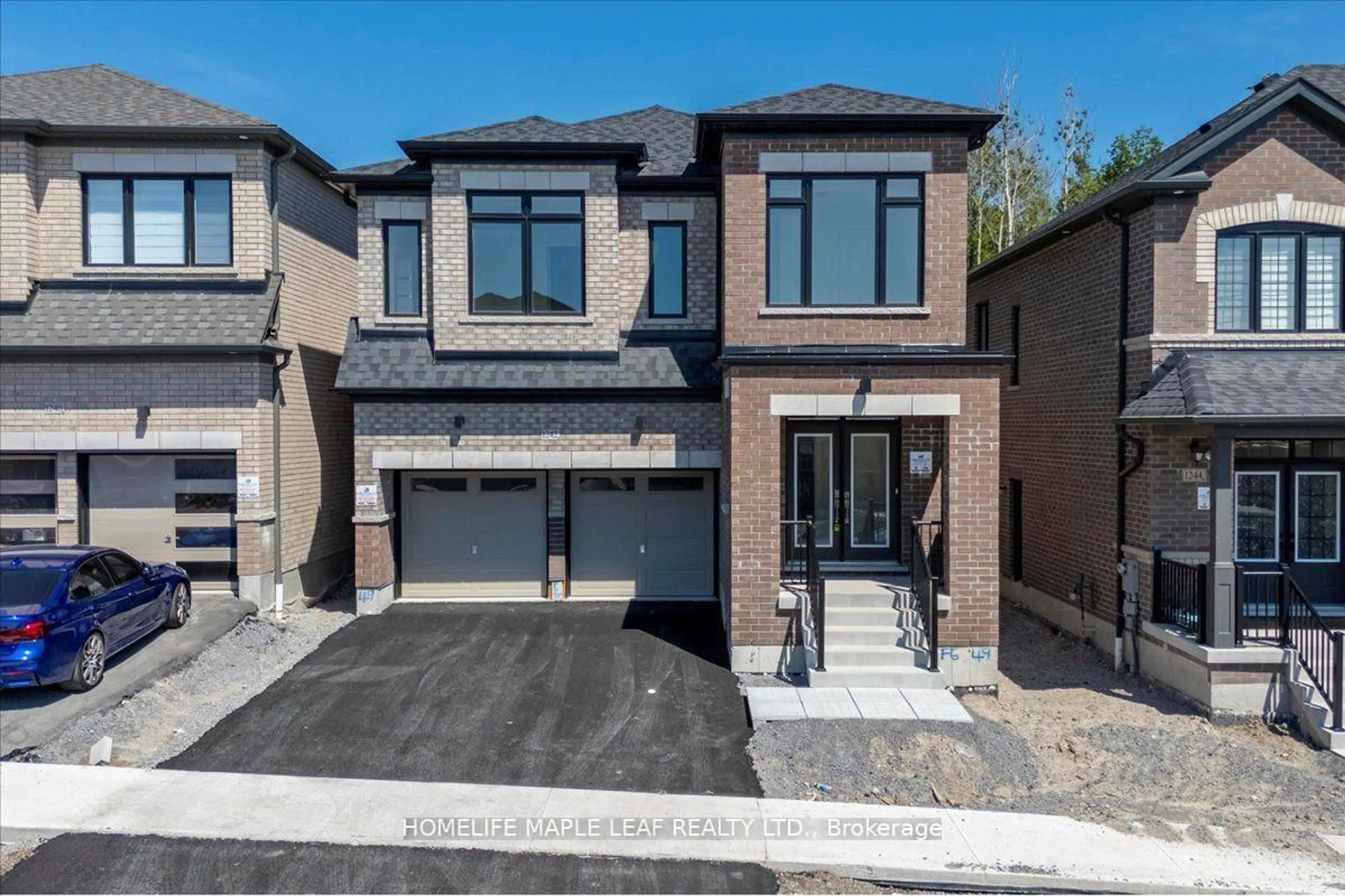 Home with brick exterior material, street for 1242 Talisman Manr, Pickering Ontario L1X 0R8