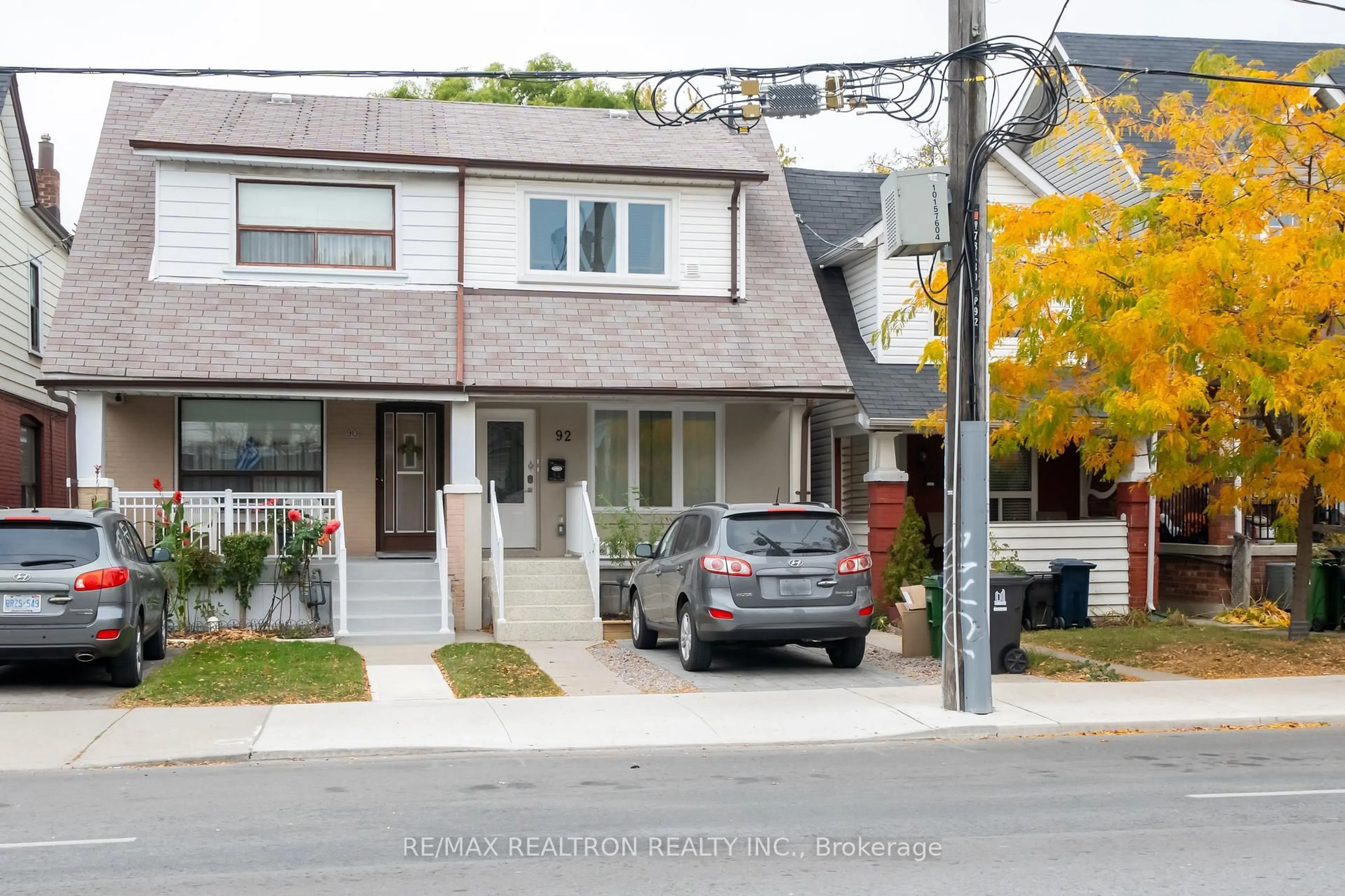 Home with vinyl exterior material, street for 92 Donlands Ave, Toronto Ontario M4J 3P1