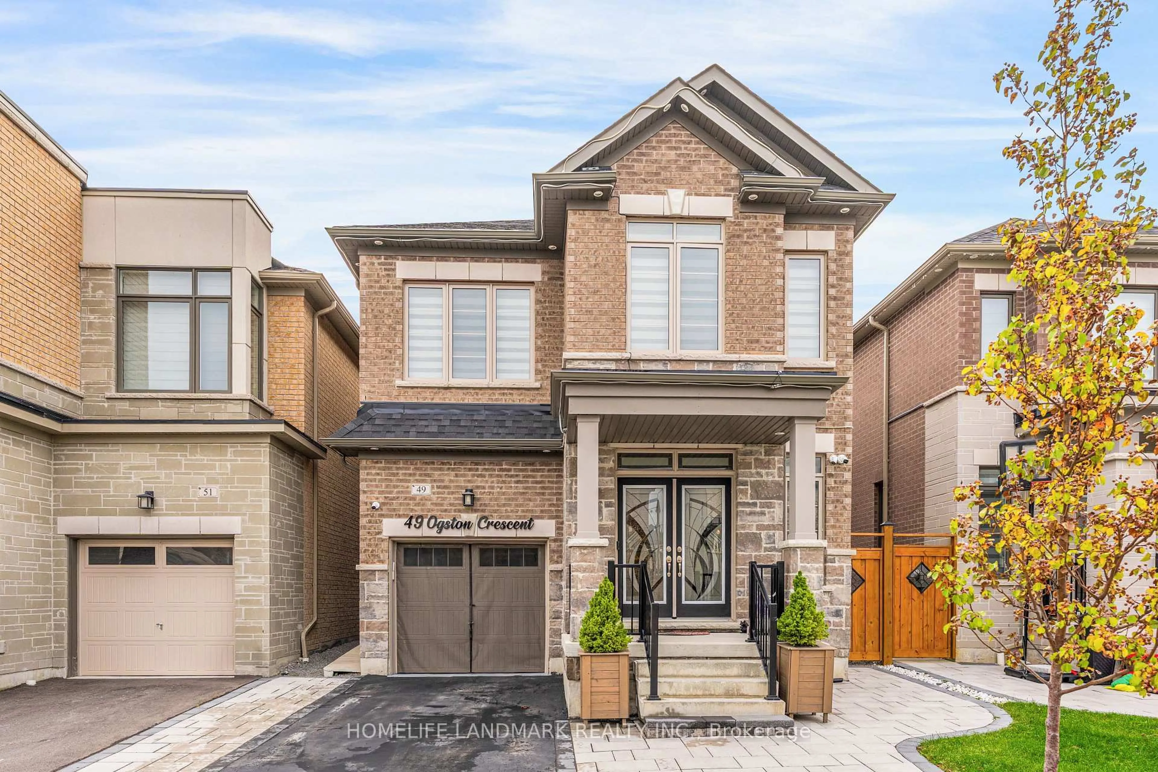 Home with brick exterior material, street for 49 Ogston Cres, Whitby Ontario L1P 0H2