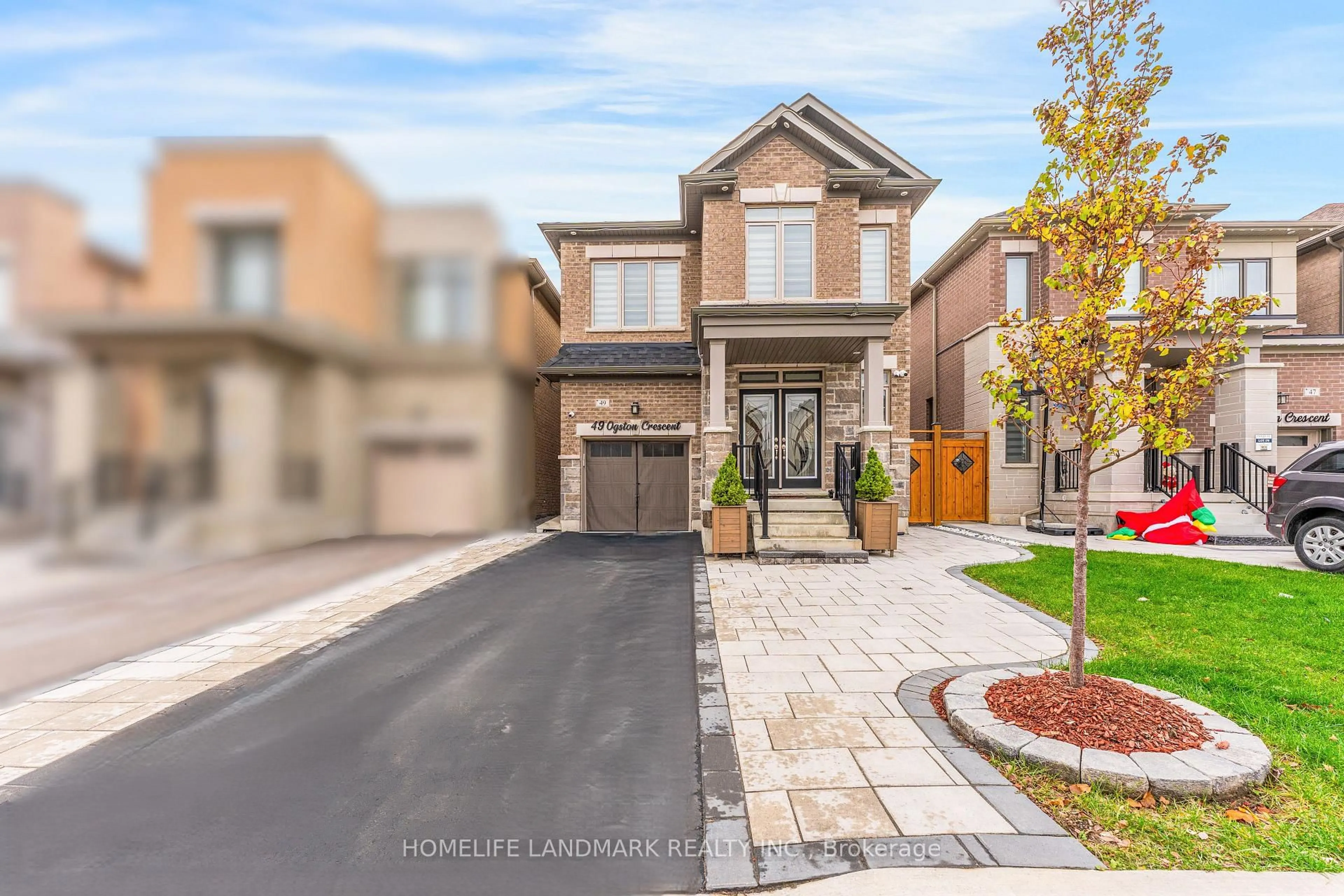 Home with brick exterior material, street for 49 Ogston Cres, Whitby Ontario L1P 0H2