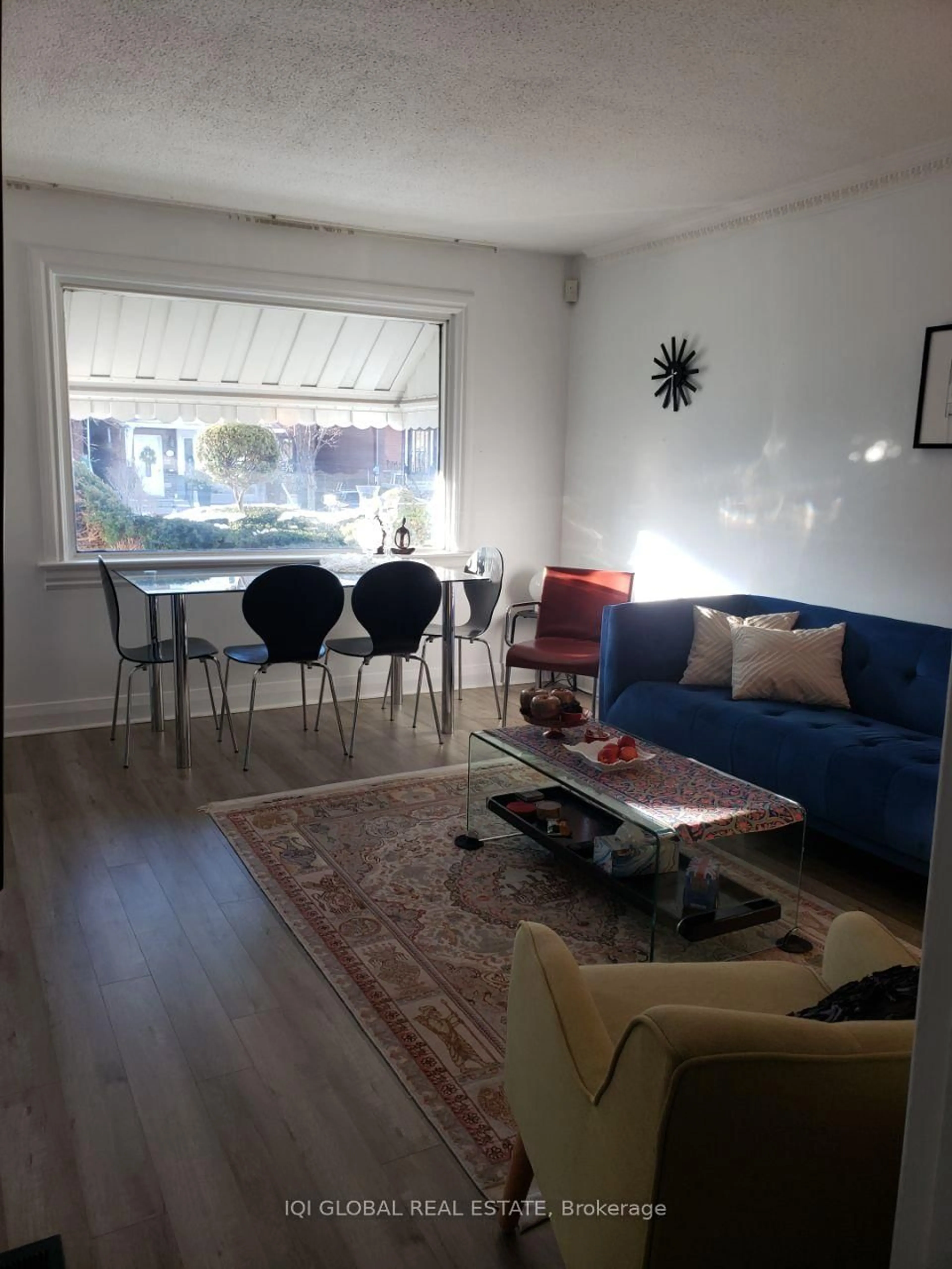 Living room with furniture, wood/laminate floor for 50 Woodville Ave, Toronto Ontario M4K 2J6