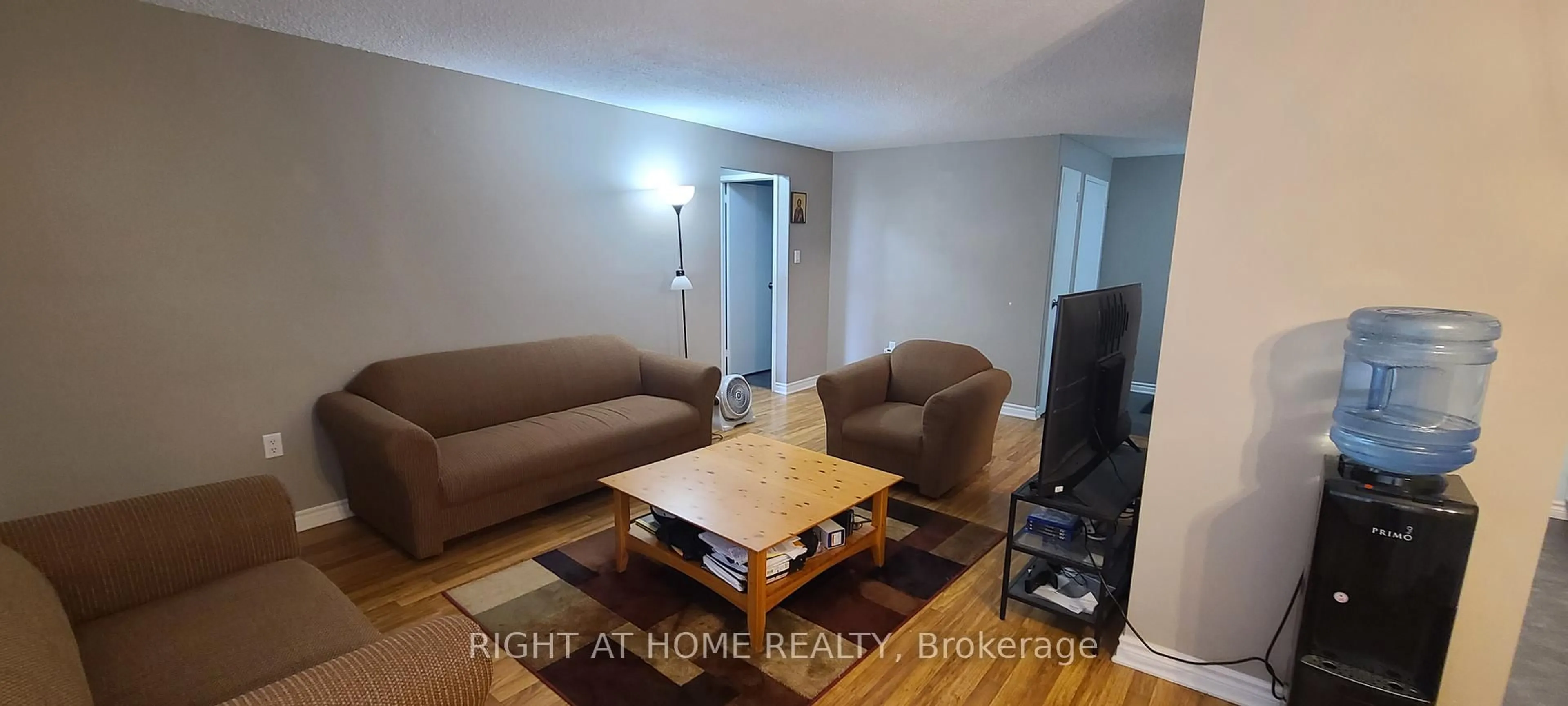 Living room with furniture, wood/laminate floor for 936 Glen St #414, Oshawa Ontario L1J 5Z7