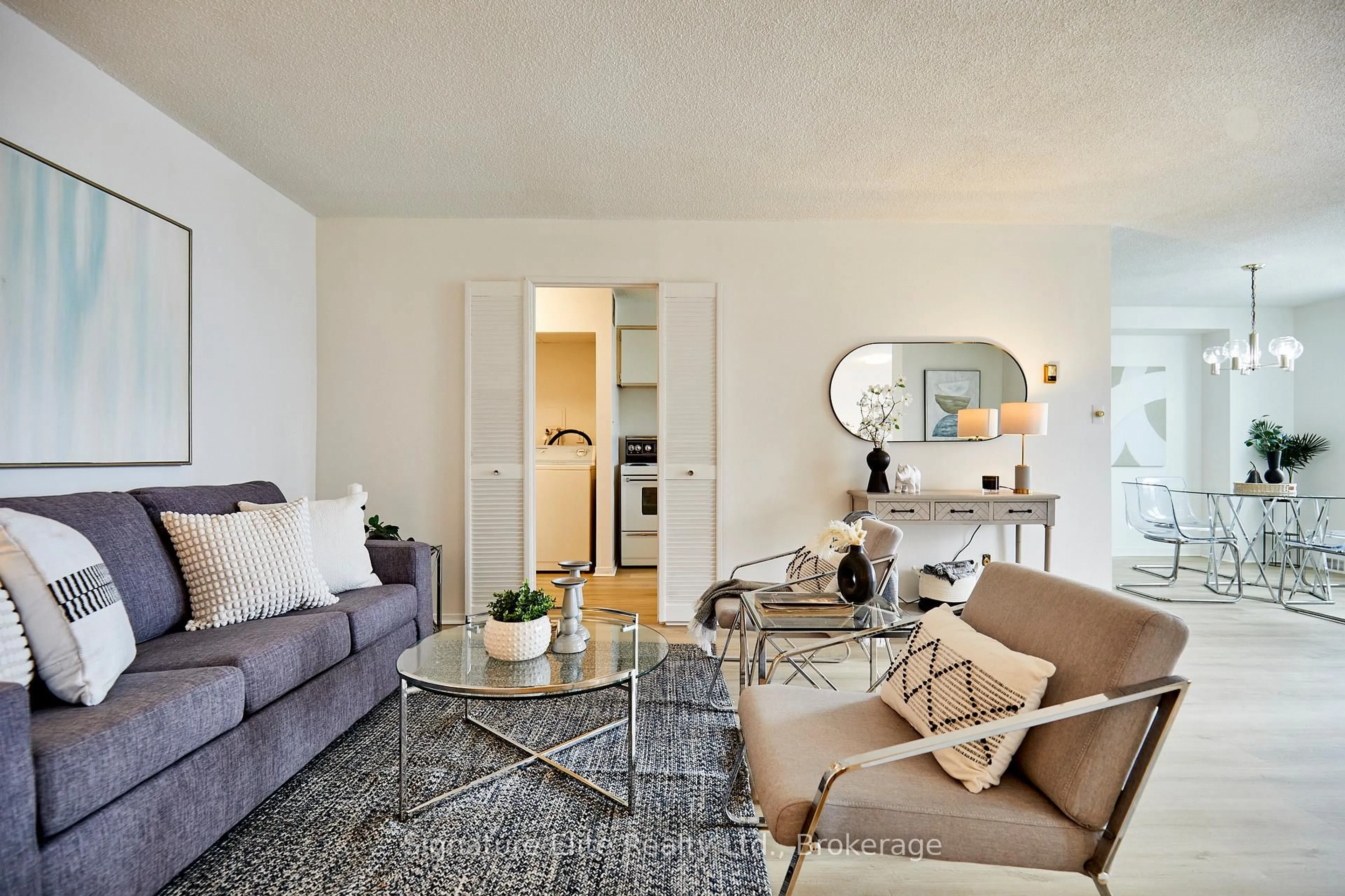 Living room with furniture, unknown for 90 Ling Rd #906, Toronto Ontario M1E 4Y3