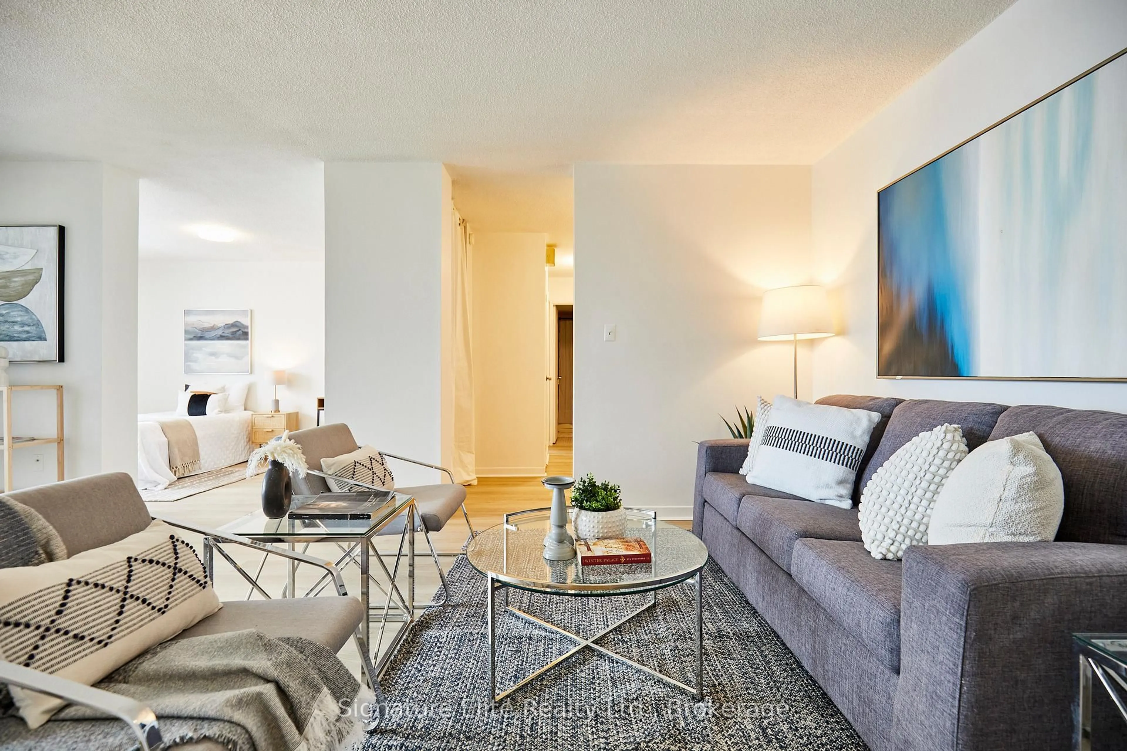 Living room with furniture, unknown for 90 Ling Rd #906, Toronto Ontario M1E 4Y3