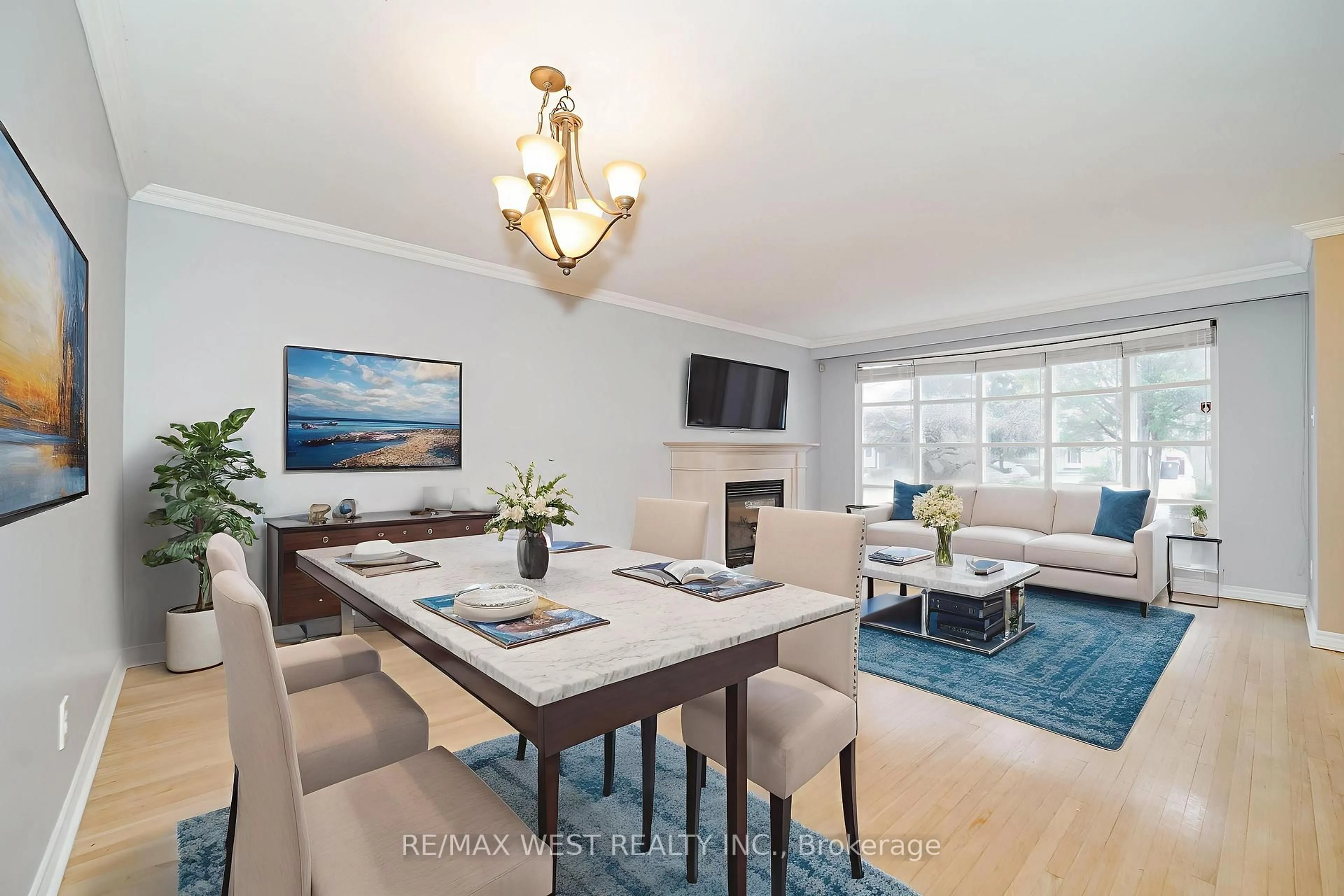 Living room with furniture, wood/laminate floor for 220 Catalina Dr, Toronto Ontario M1E 1B7