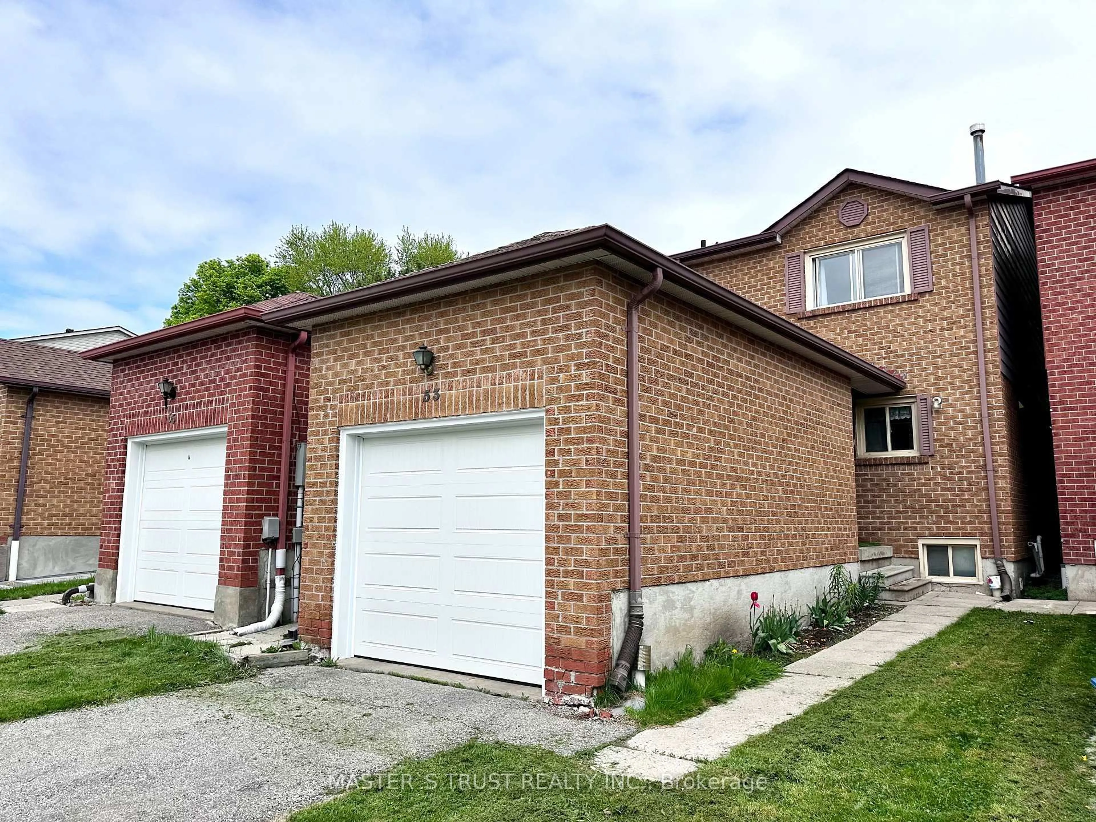Home with brick exterior material, street for 53 Montezuma Tr, Toronto Ontario M1V 1K4