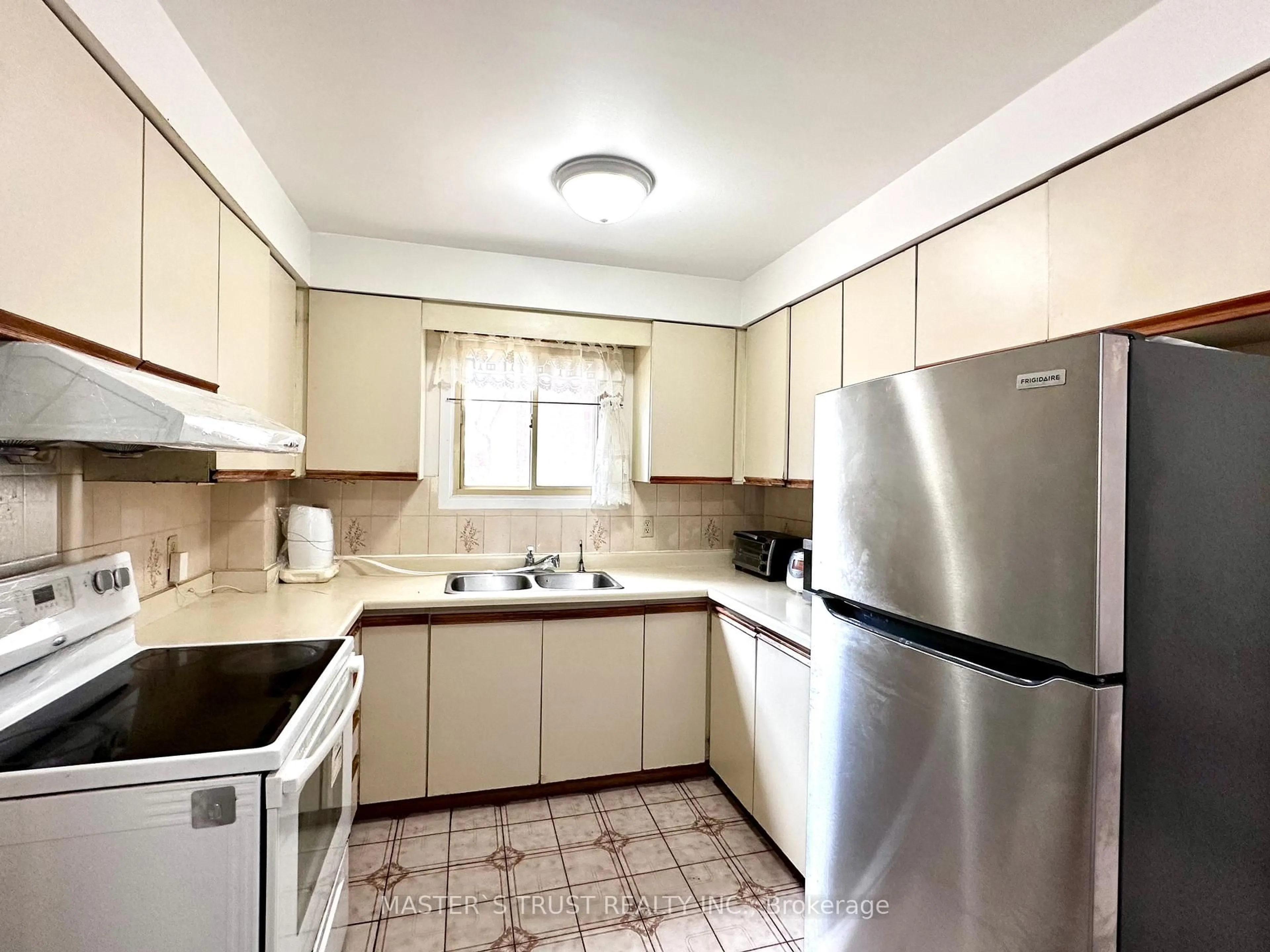 Standard kitchen, unknown for 53 Montezuma Tr, Toronto Ontario M1V 1K4