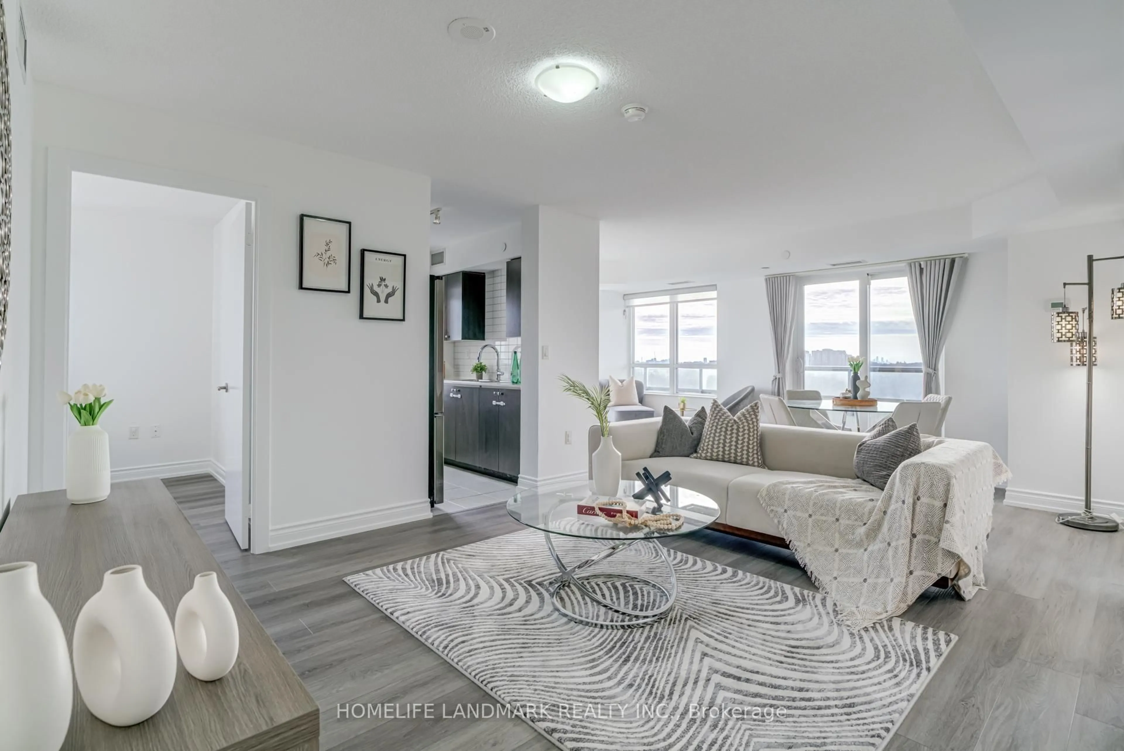 Living room with furniture, unknown for 1346 Danforth Rd #1105, Toronto Ontario M1J 0A9