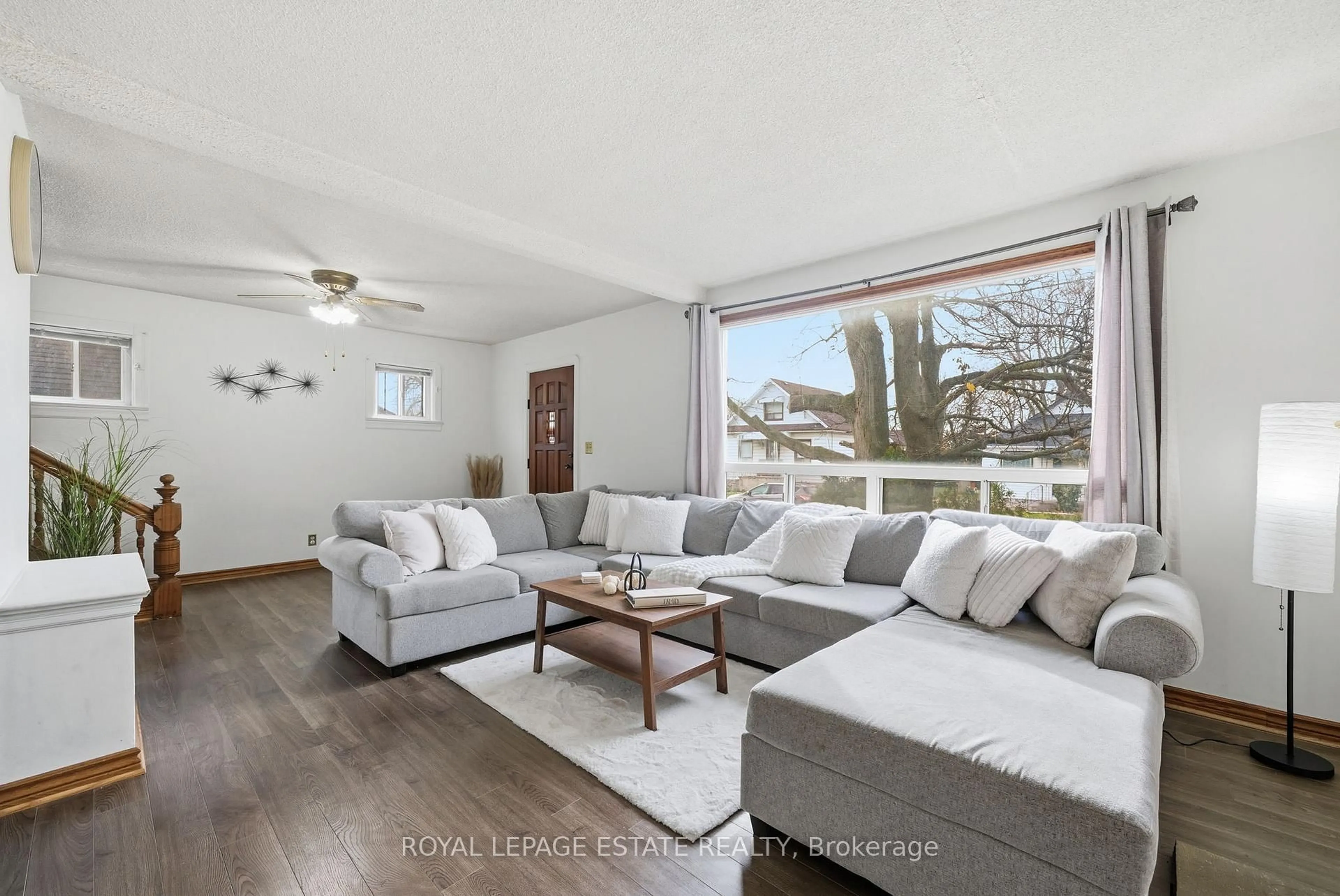 Living room with furniture, wood/laminate floor for 349 Oshawa Blvd, Oshawa Ontario L1H 5S3