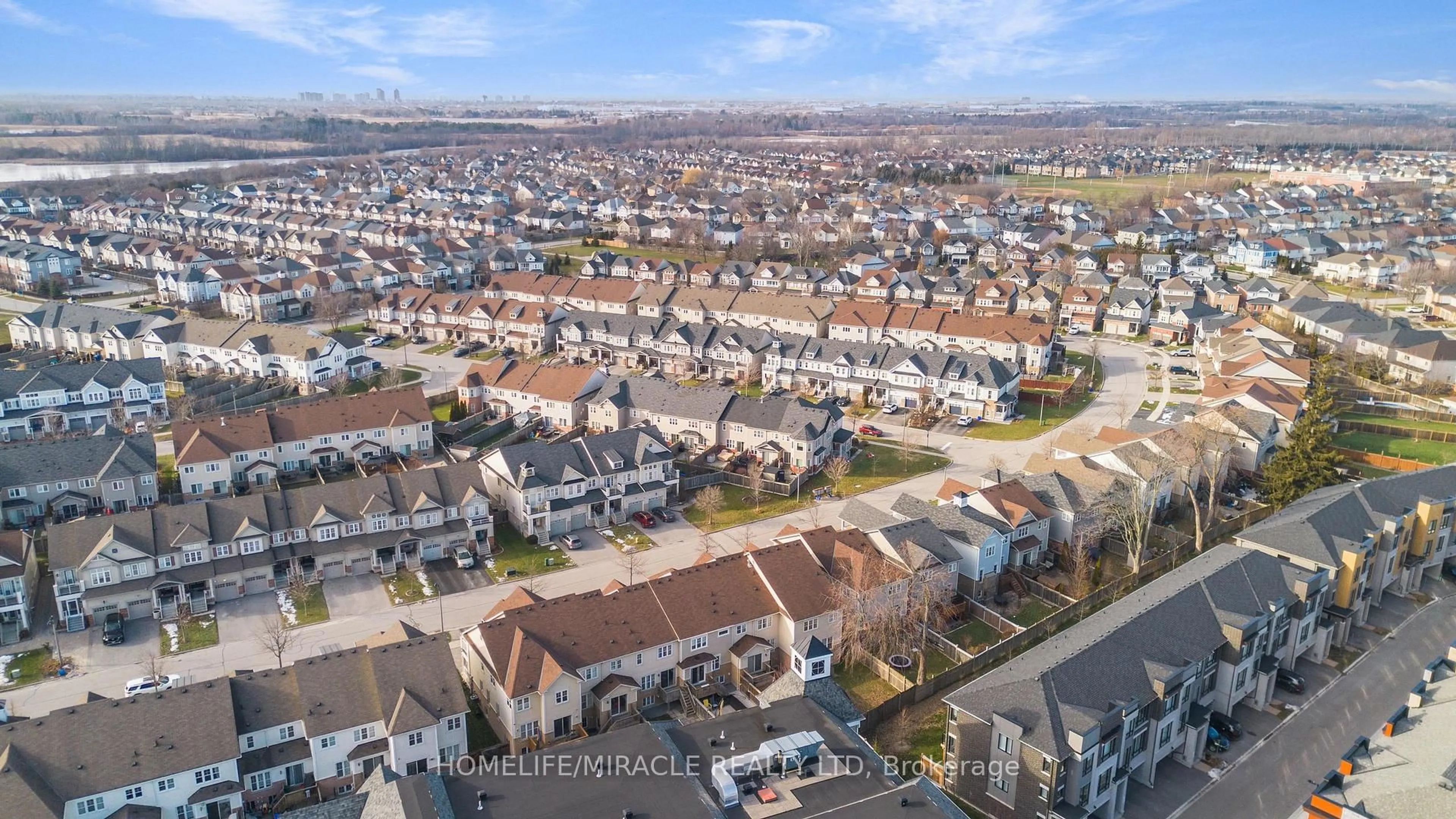 A pic from outside/outdoor area/front of a property/back of a property/a pic from drone, city buildings view from balcony for 650 Gordon St #303, Whitby Ontario L1N 0C1