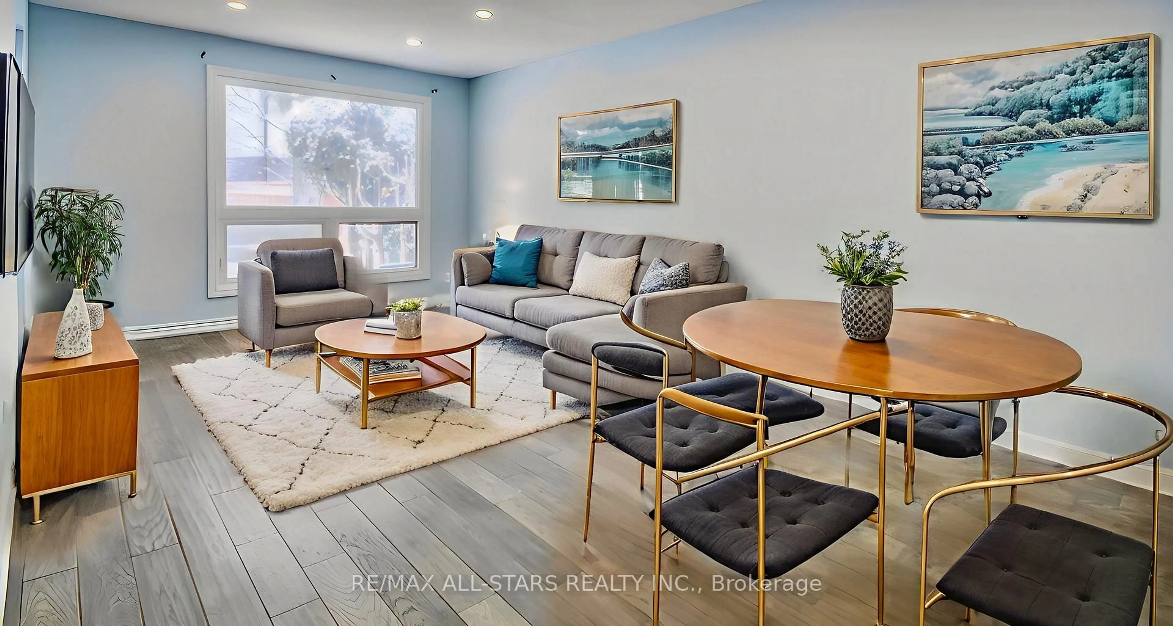 Living room with furniture, wood/laminate floor for 50 Verne Cres #10, Toronto Ontario M1B 2X1