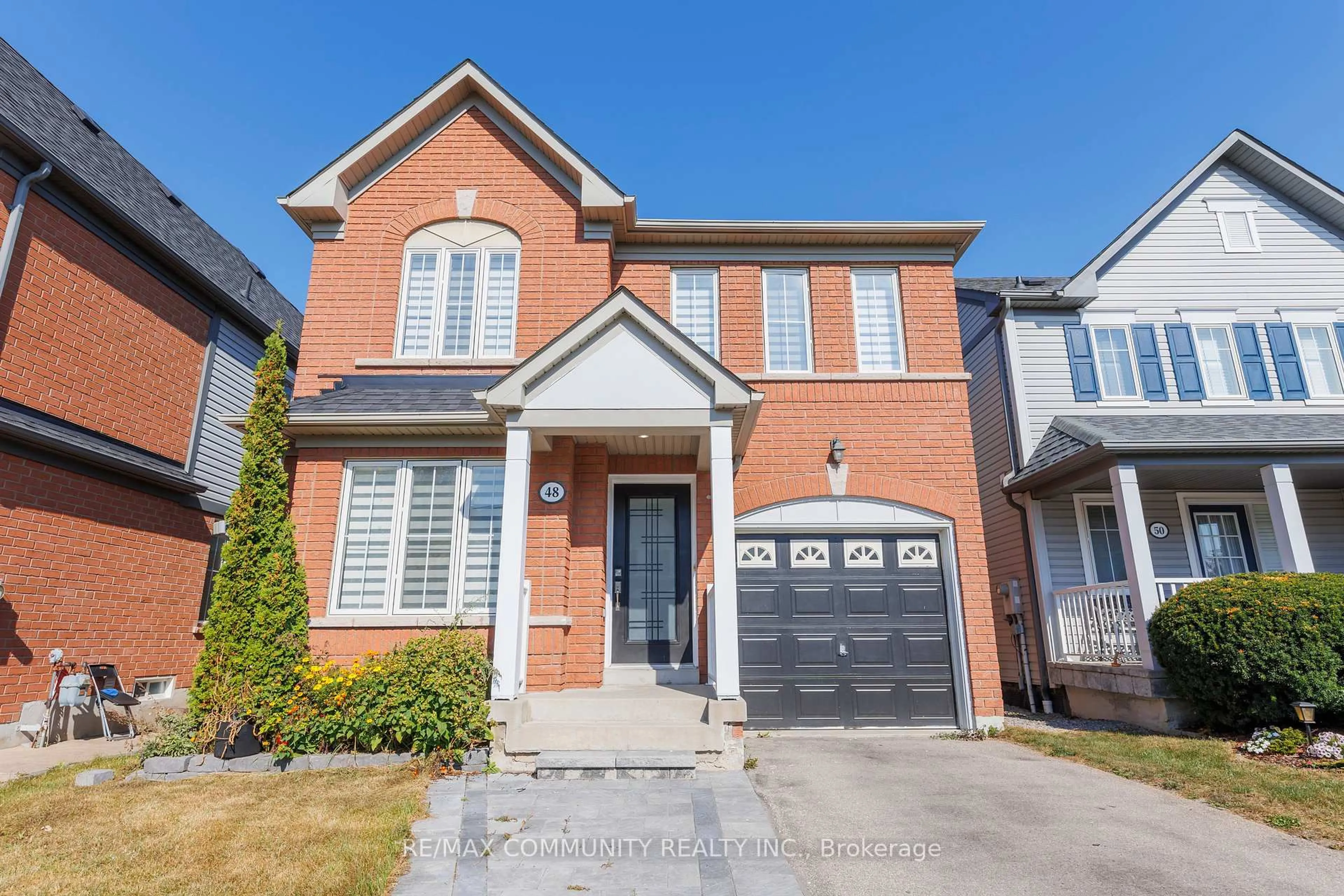 Home with brick exterior material, street for 48 McNicol Cres, Ajax Ontario L1Z 1Y8