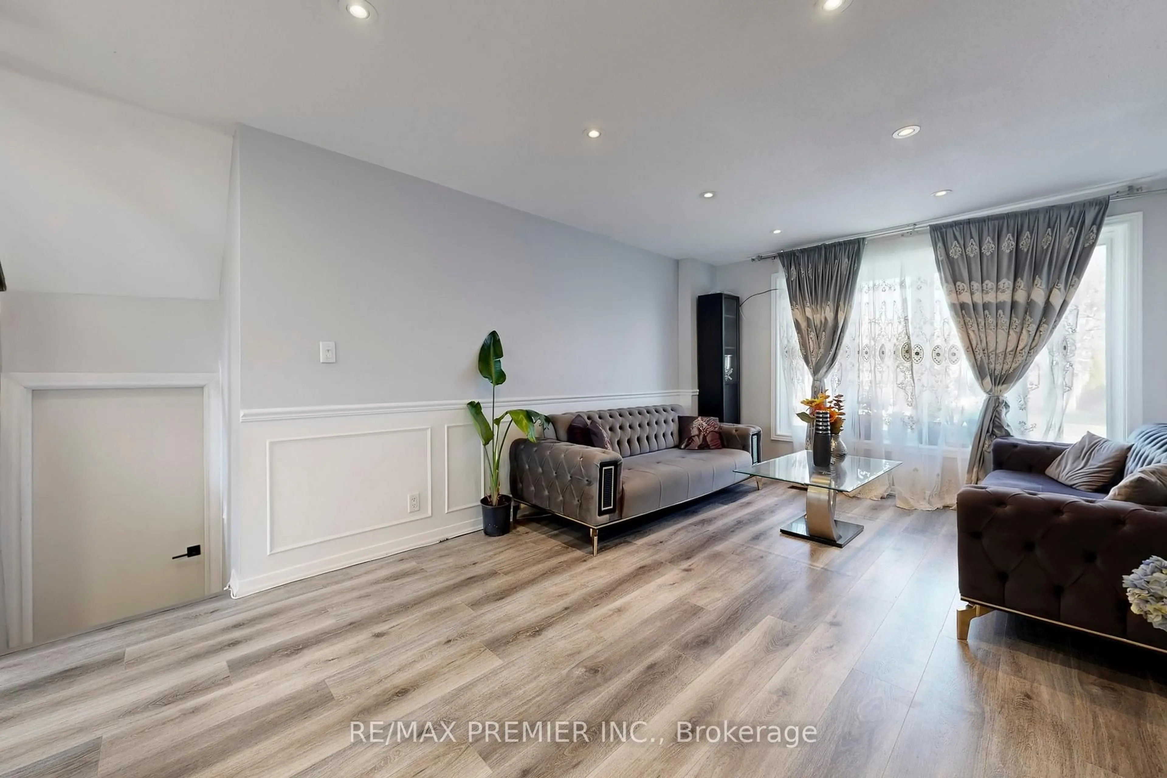 Living room with furniture, wood/laminate floor for 888 Krosno Blvd, Pickering Ontario L1W 1H4