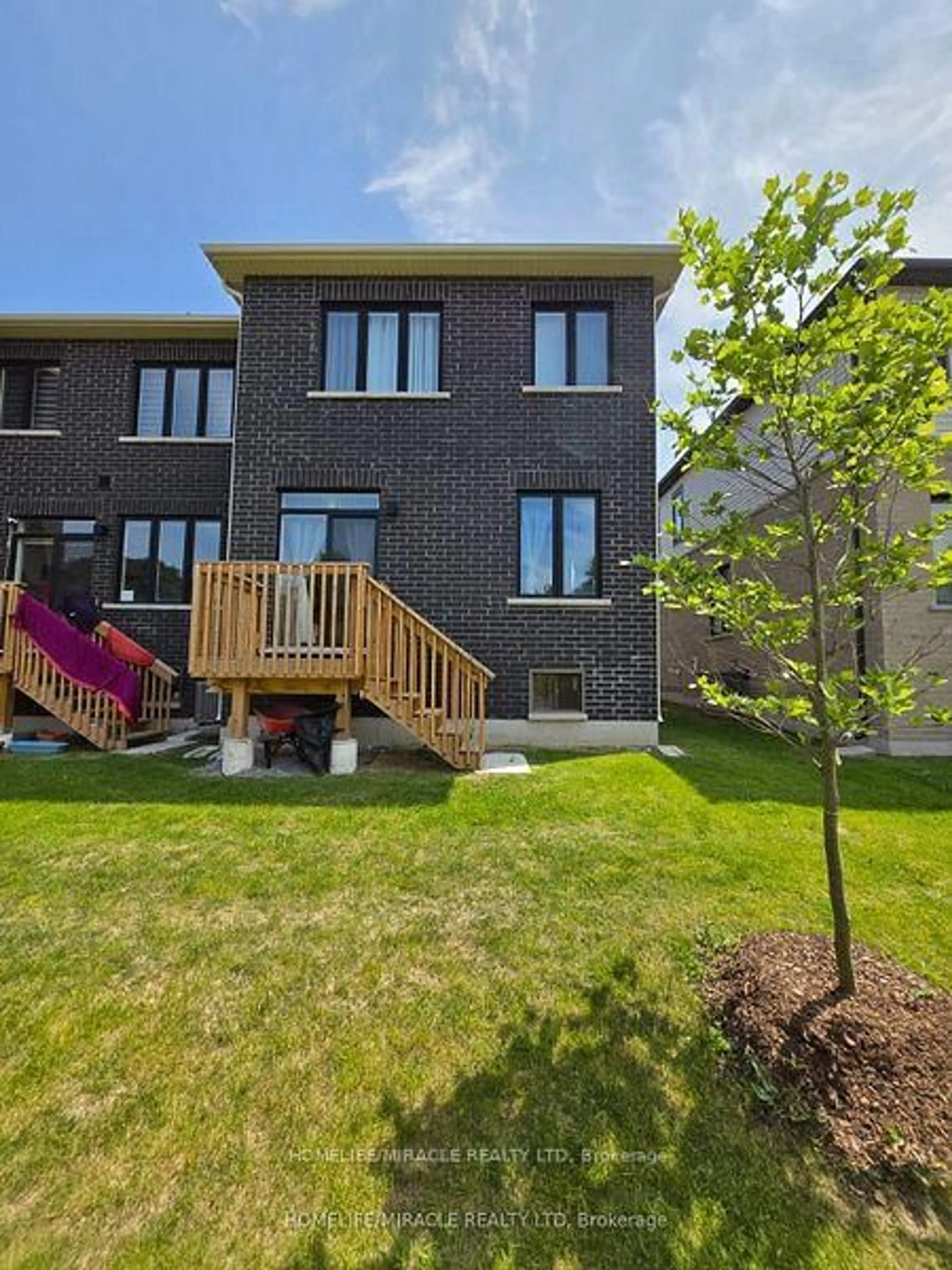 Home with brick exterior material, street for 296 Okanagan Path, Oshawa Ontario L1H 0A7