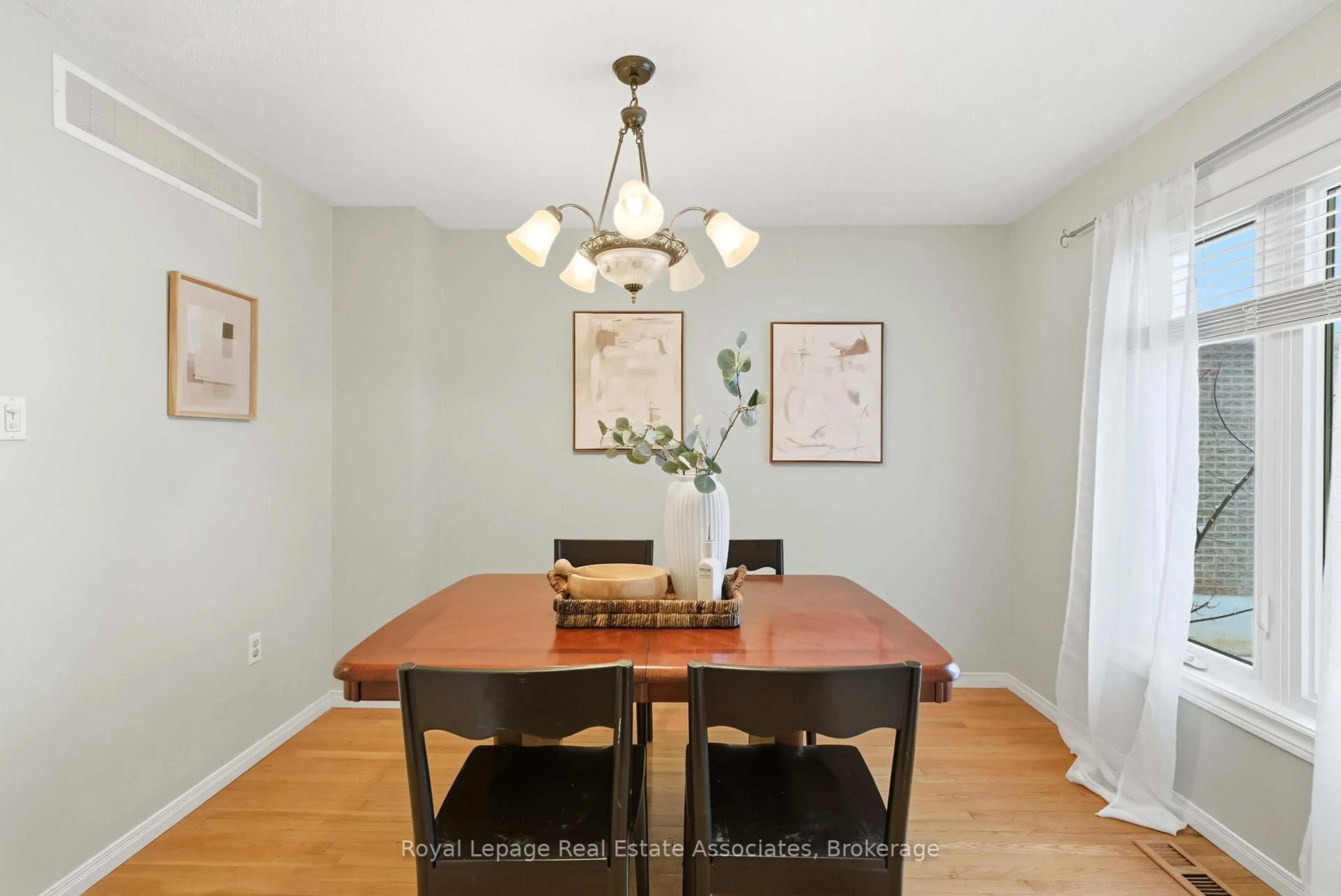 Dining room, wood/laminate floor for 38 Bluebell Cres, Whitby Ontario L1P 1L1