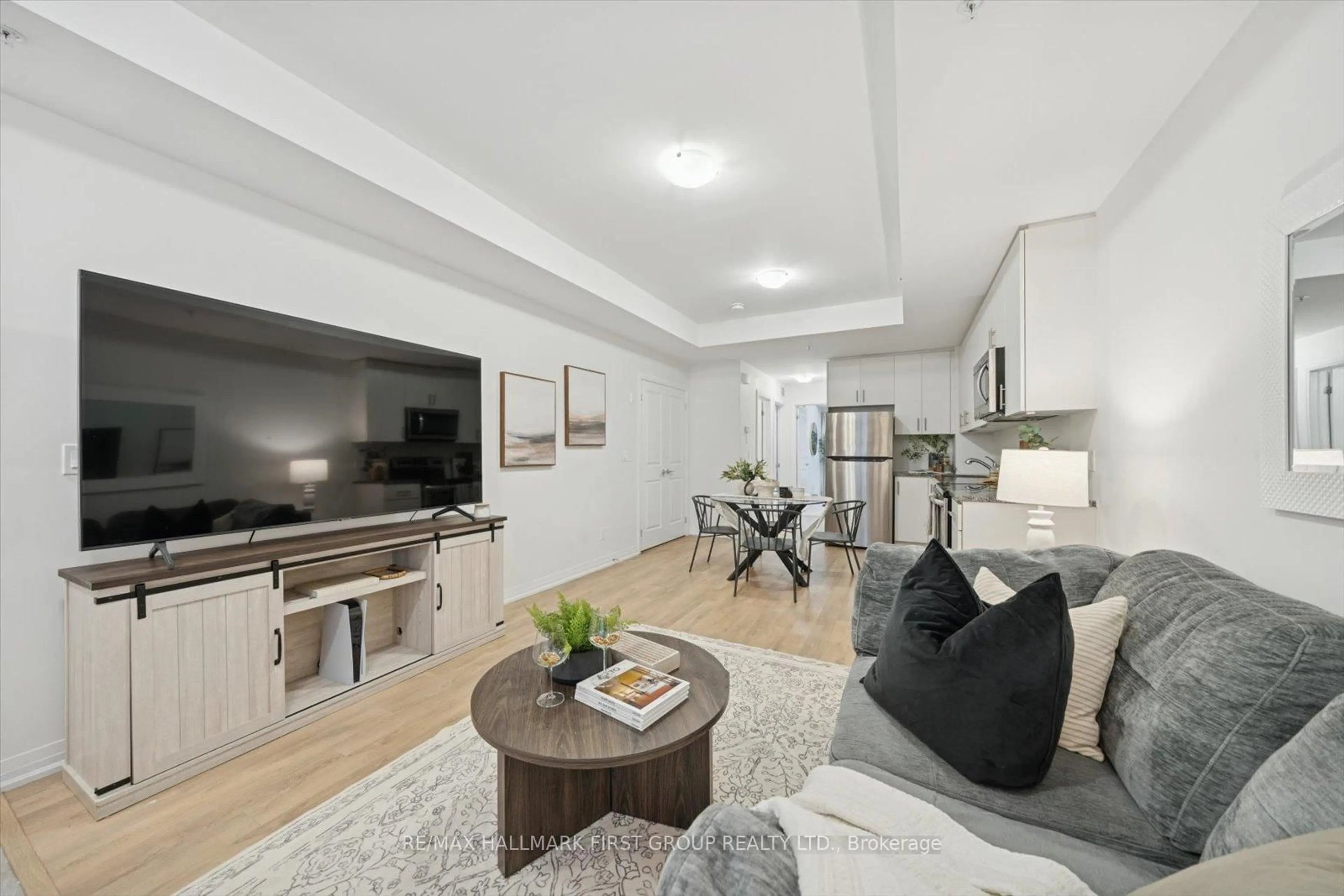 Living room with furniture, unknown for 2635 William Jackson Dr #1013, Pickering Ontario L1X 0L5