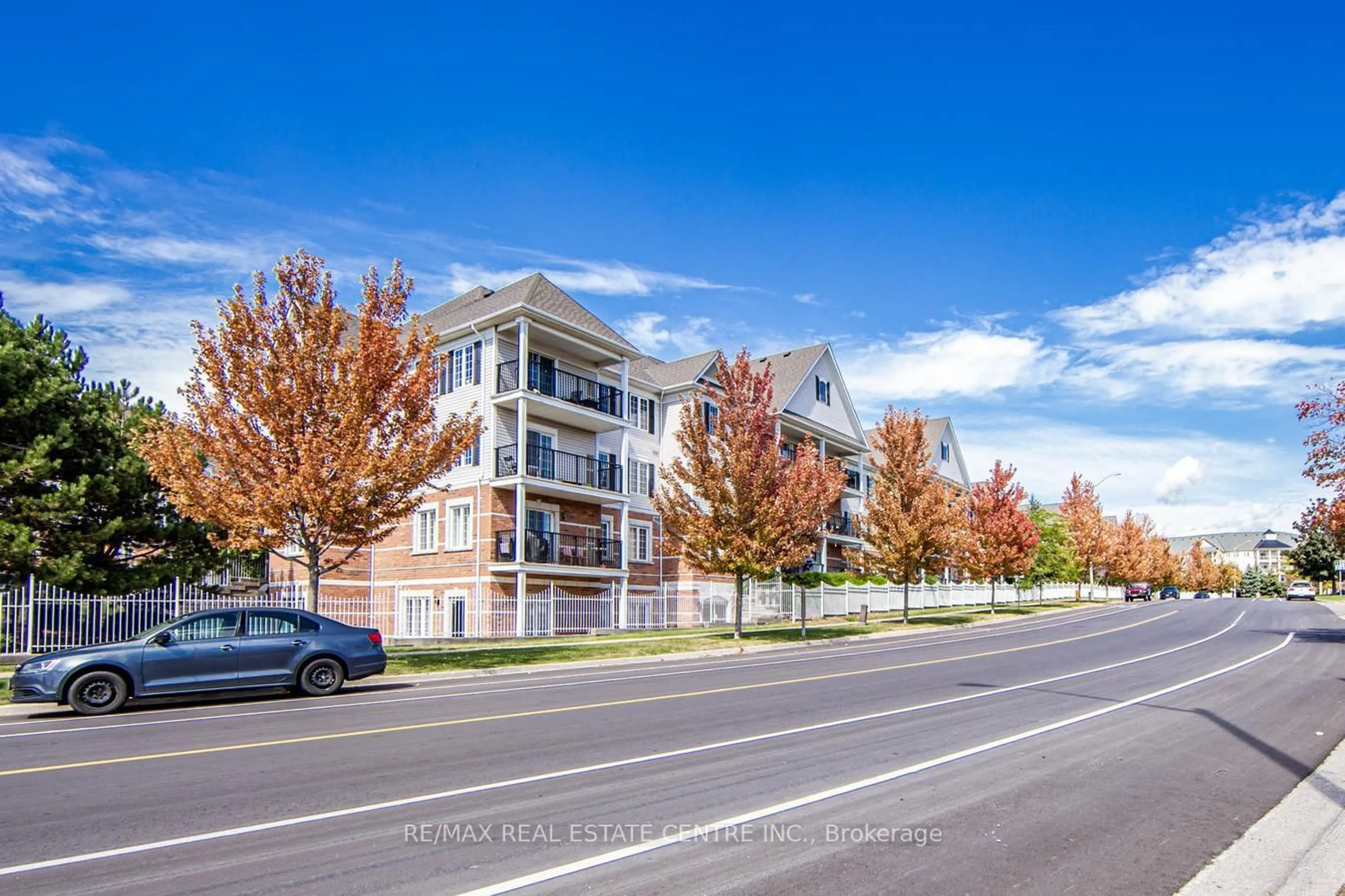 A pic from outside/outdoor area/front of a property/back of a property/a pic from drone, street for 106 Aspen Springs Dr #207, Clarington Ontario L1C 5N7