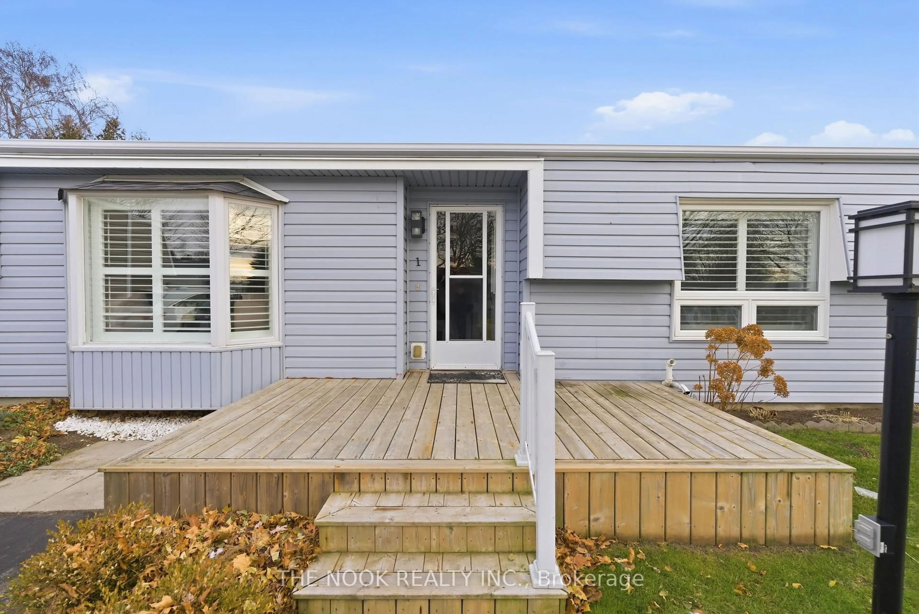 Home with vinyl exterior material, street for 1 Steelhead Lane, Clarington Ontario L1B 1B5