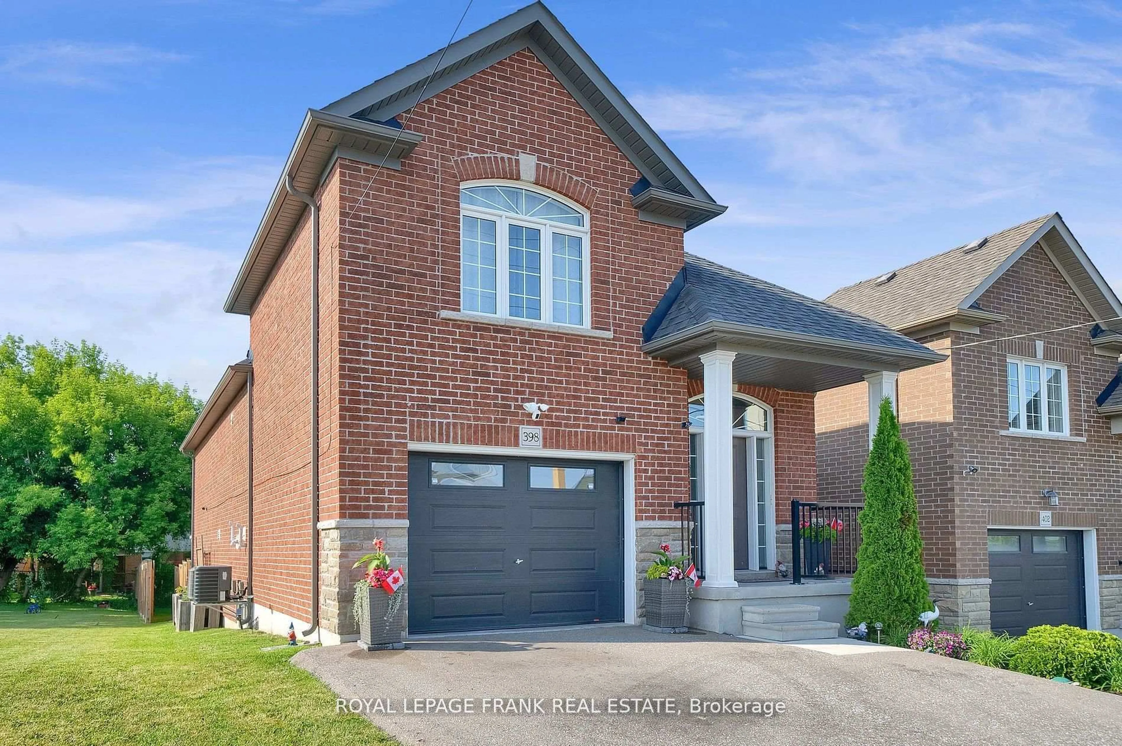 Home with brick exterior material, street for 398 Olive Ave, Oshawa Ontario L1H 2R1