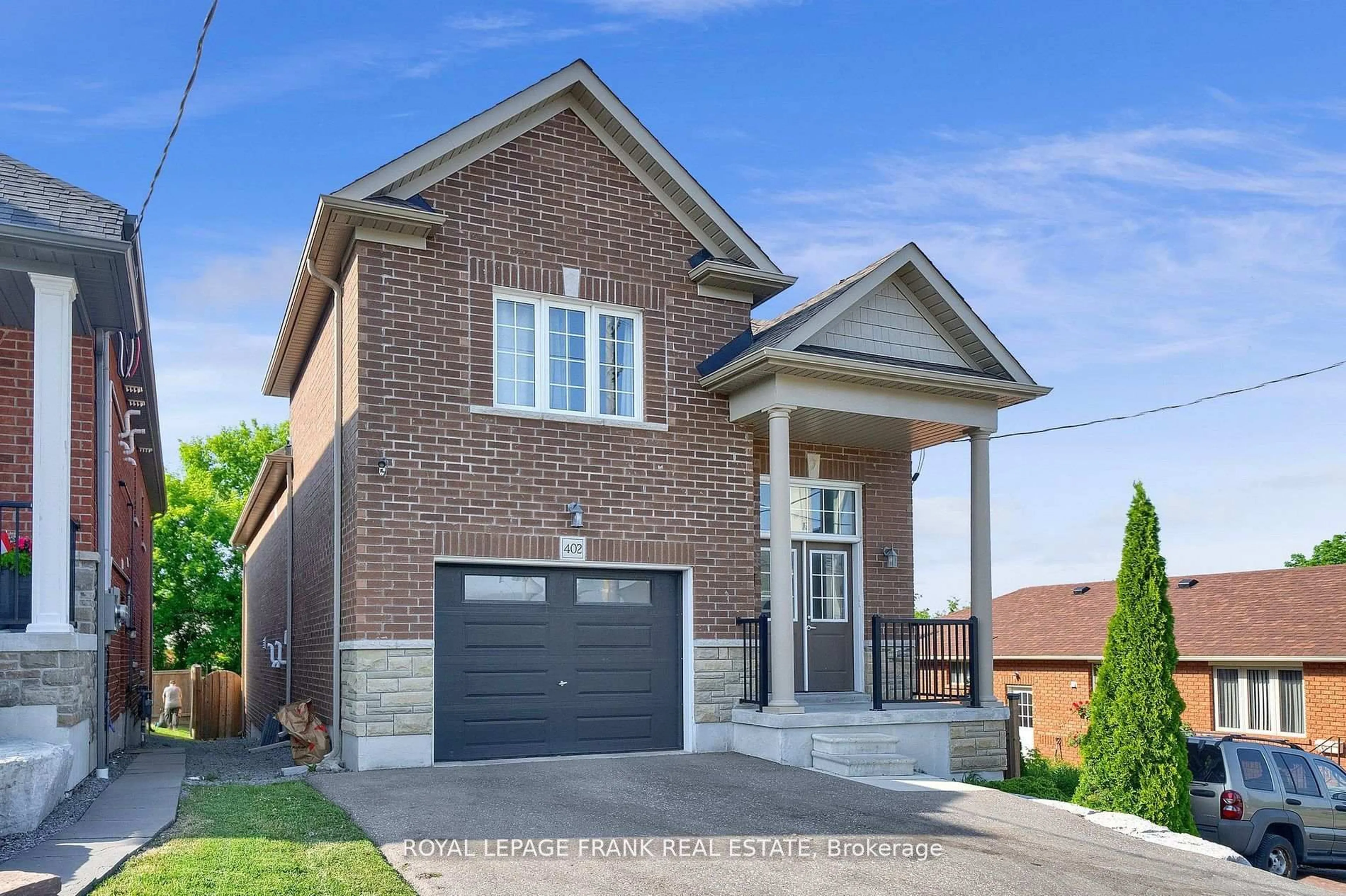 Home with brick exterior material, street for 402 Olive Ave, Oshawa Ontario L1H 2R1