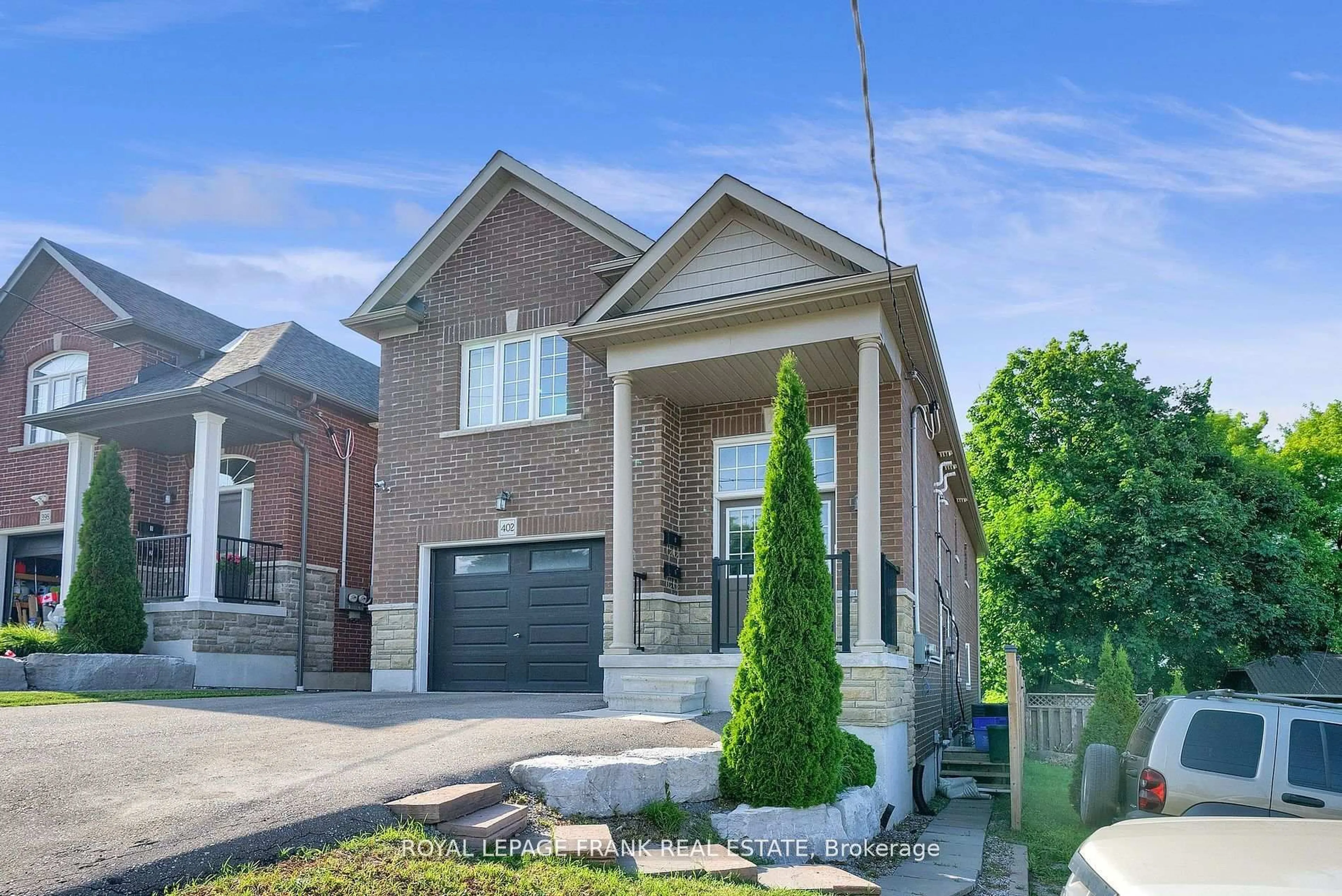 Home with brick exterior material, street for 402 Olive Ave, Oshawa Ontario L1H 2R1