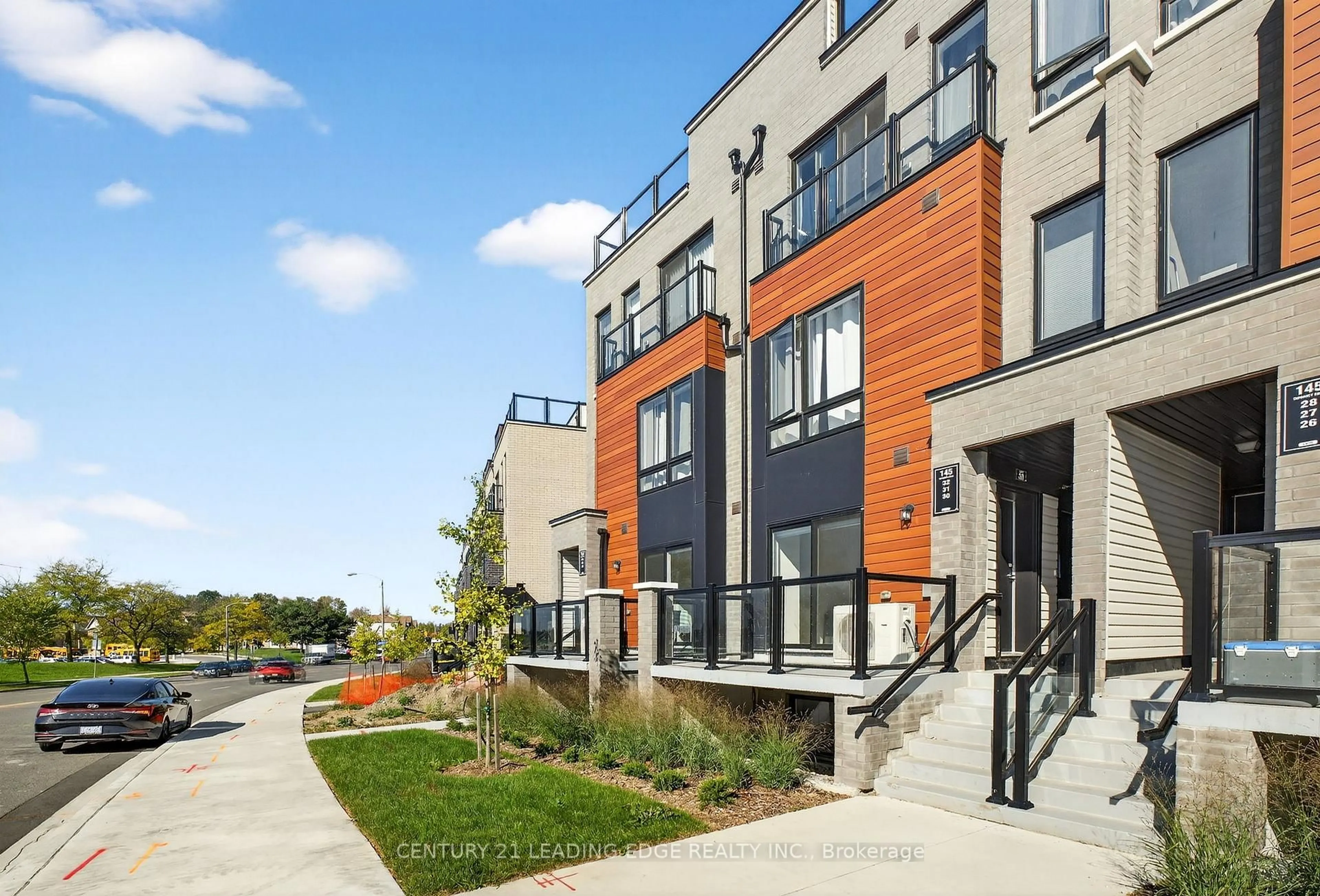 Home with brick exterior material, street for 145 Tapscott Rd #32, Toronto Ontario M1B 1E7