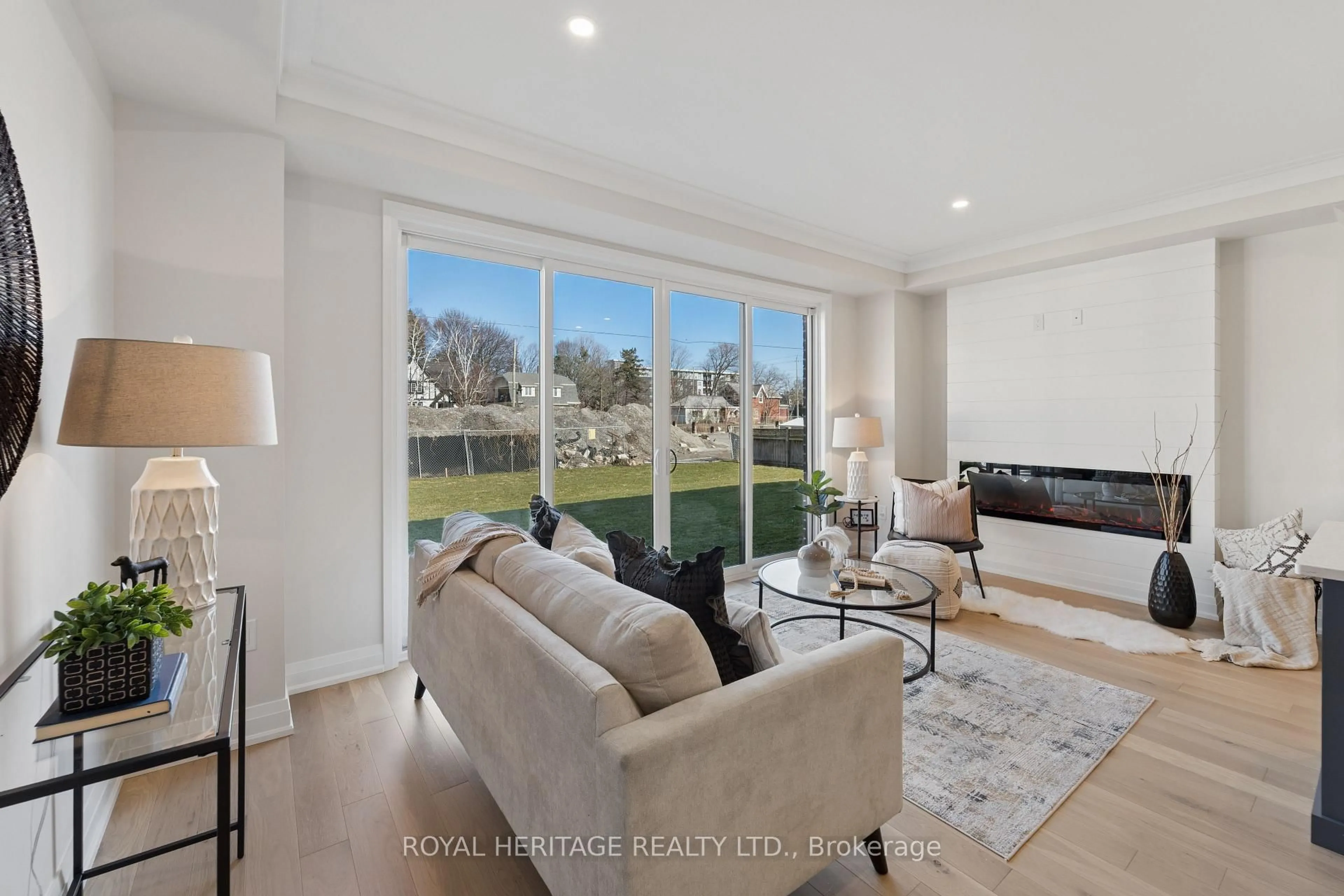 Living room with furniture, ceramic/tile floor for 127 Hickory St, Whitby Ontario L1N 3X6