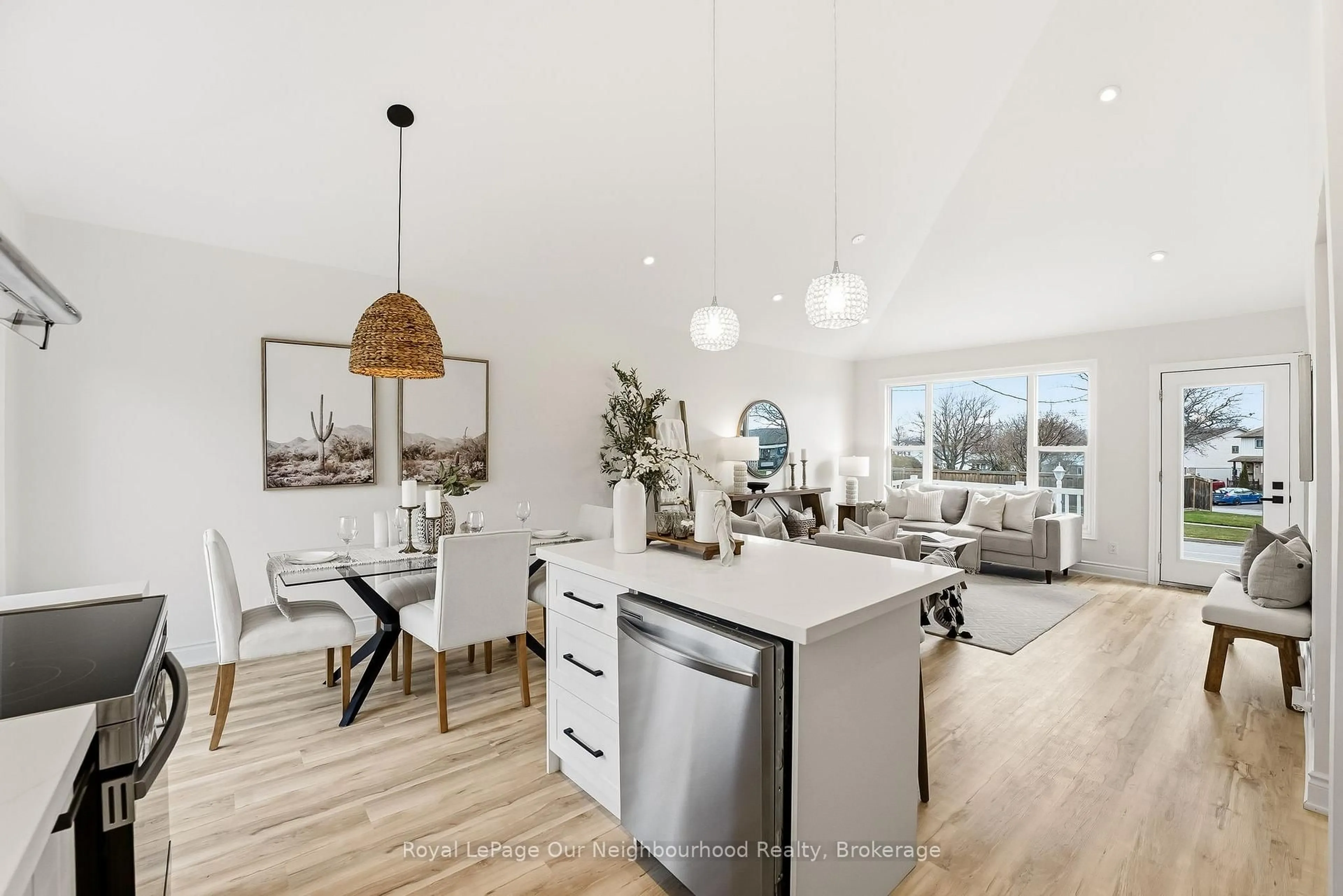 Open concept kitchen, wood/laminate floor for 1346 Scugog Ave, Oshawa Ontario L1J 1J7