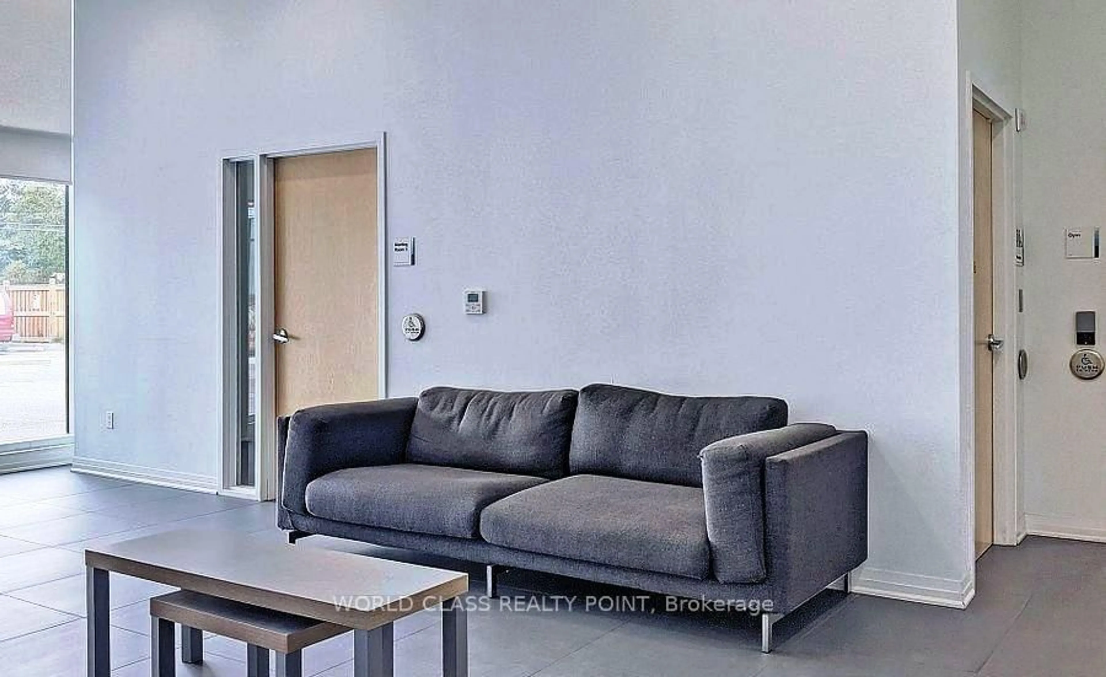 Living room with furniture, cement floor for 1900 Simcoe St #633, Oshawa Ontario L1G 4Y3