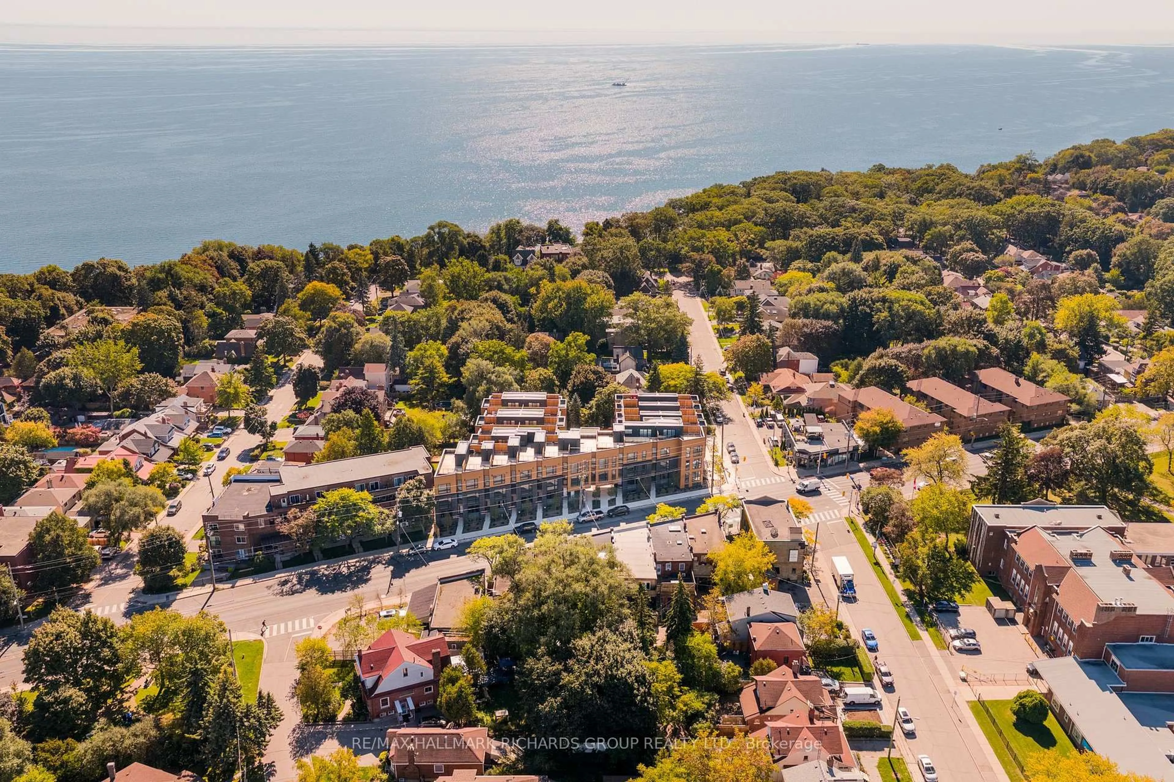 A pic from outside/outdoor area/front of a property/back of a property/a pic from drone, water/lake/river/ocean view for 35 Birchcliff Ave #42, Toronto Ontario M1N 3C5