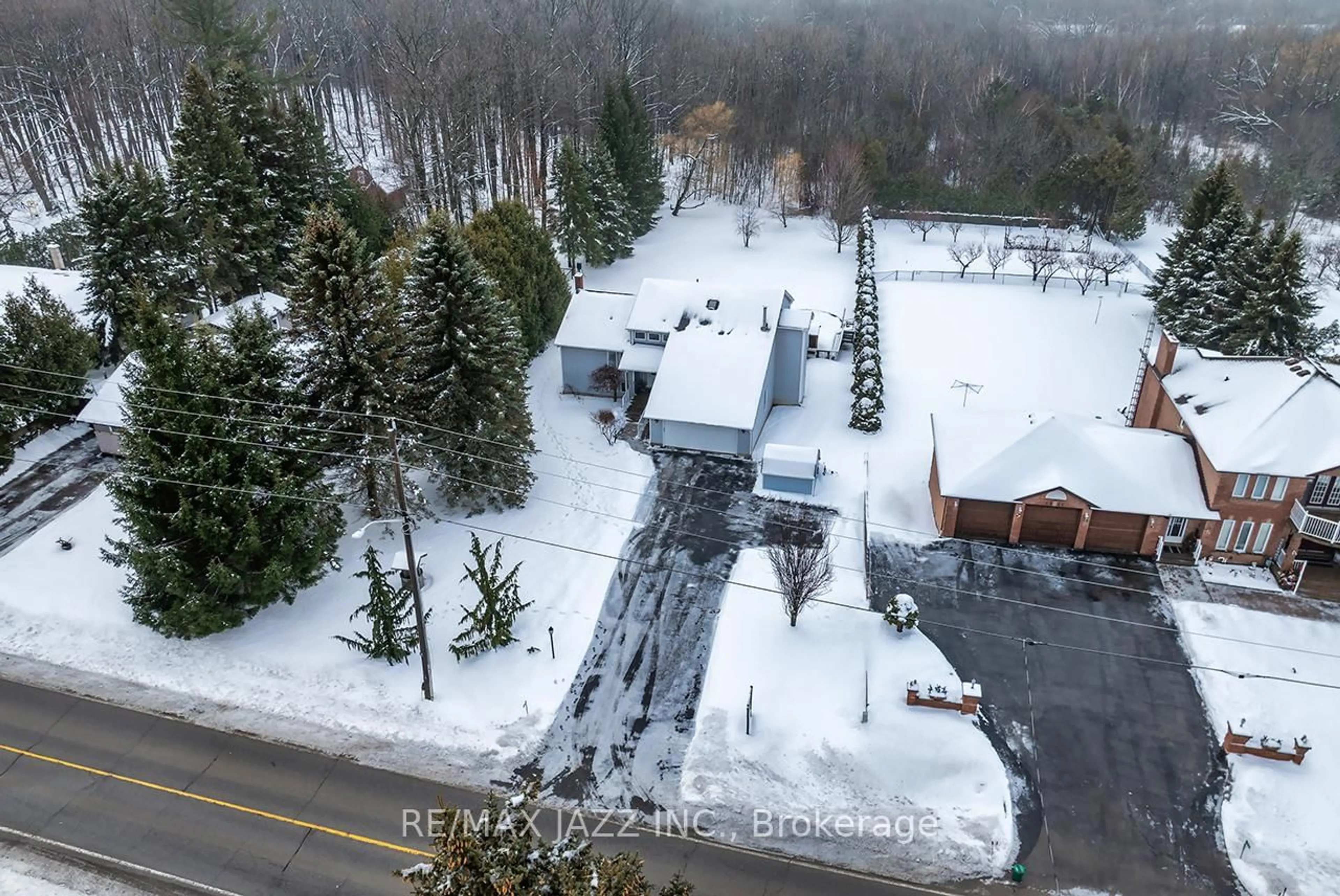 A pic from outside/outdoor area/front of a property/back of a property/a pic from drone, street for 4534 Trulls Rd, Clarington Ontario L0B 1J0