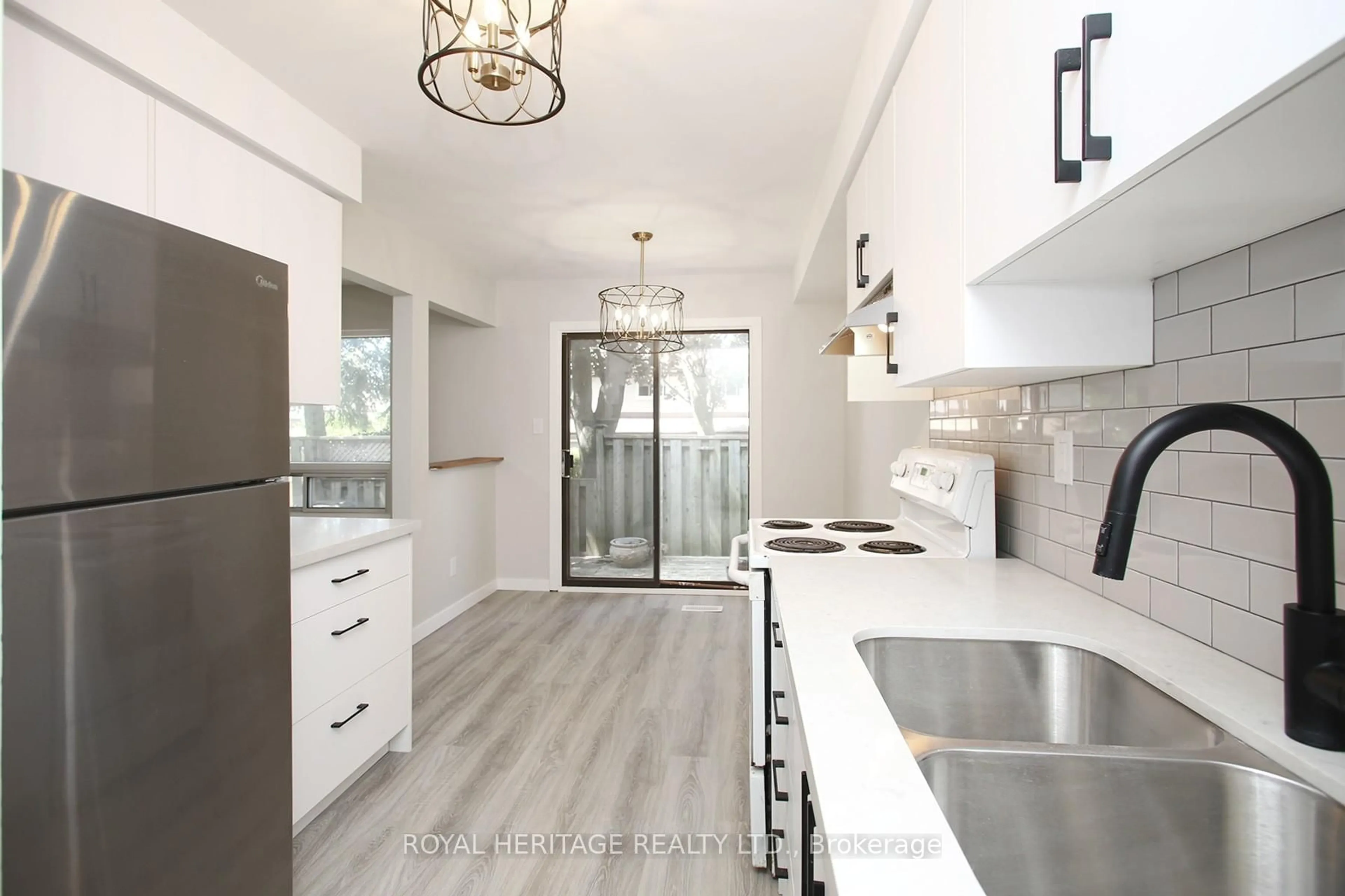 Open concept kitchen, ceramic/tile floor for 27 Parker Cres, Ajax Ontario L1S 3R4