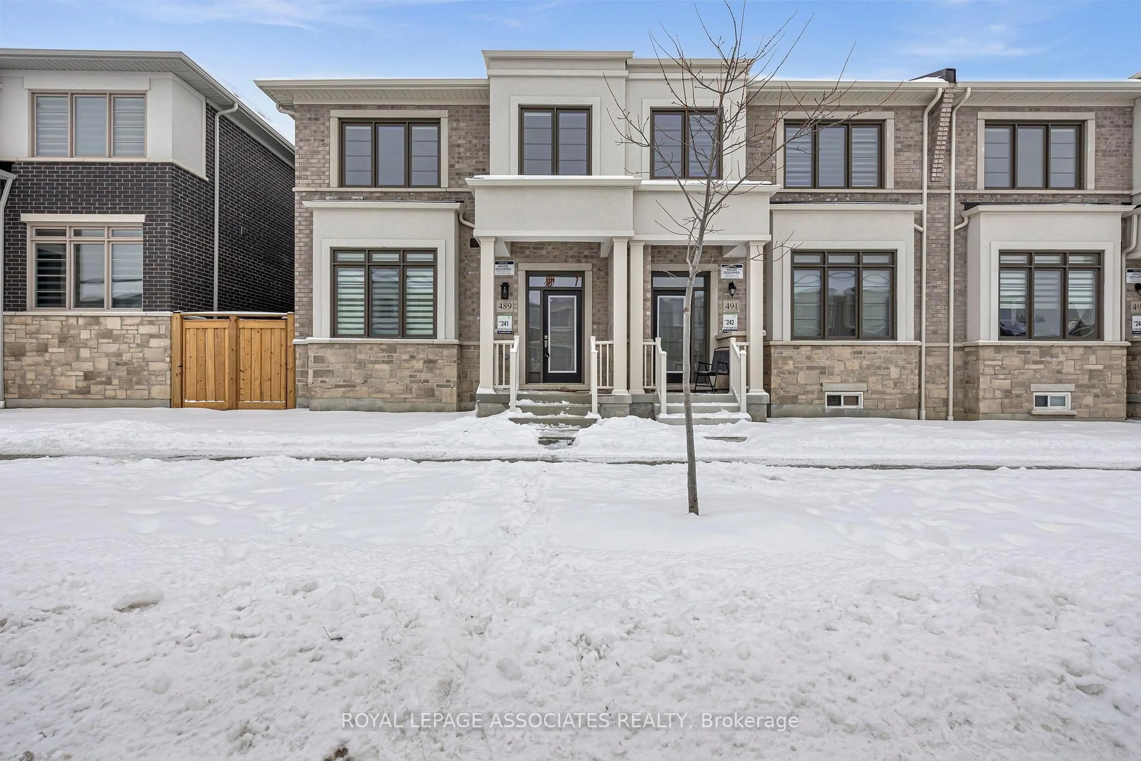 Home with brick exterior material, street for 489 Twin Streams Rd, Whitby Ontario L1P 0P6