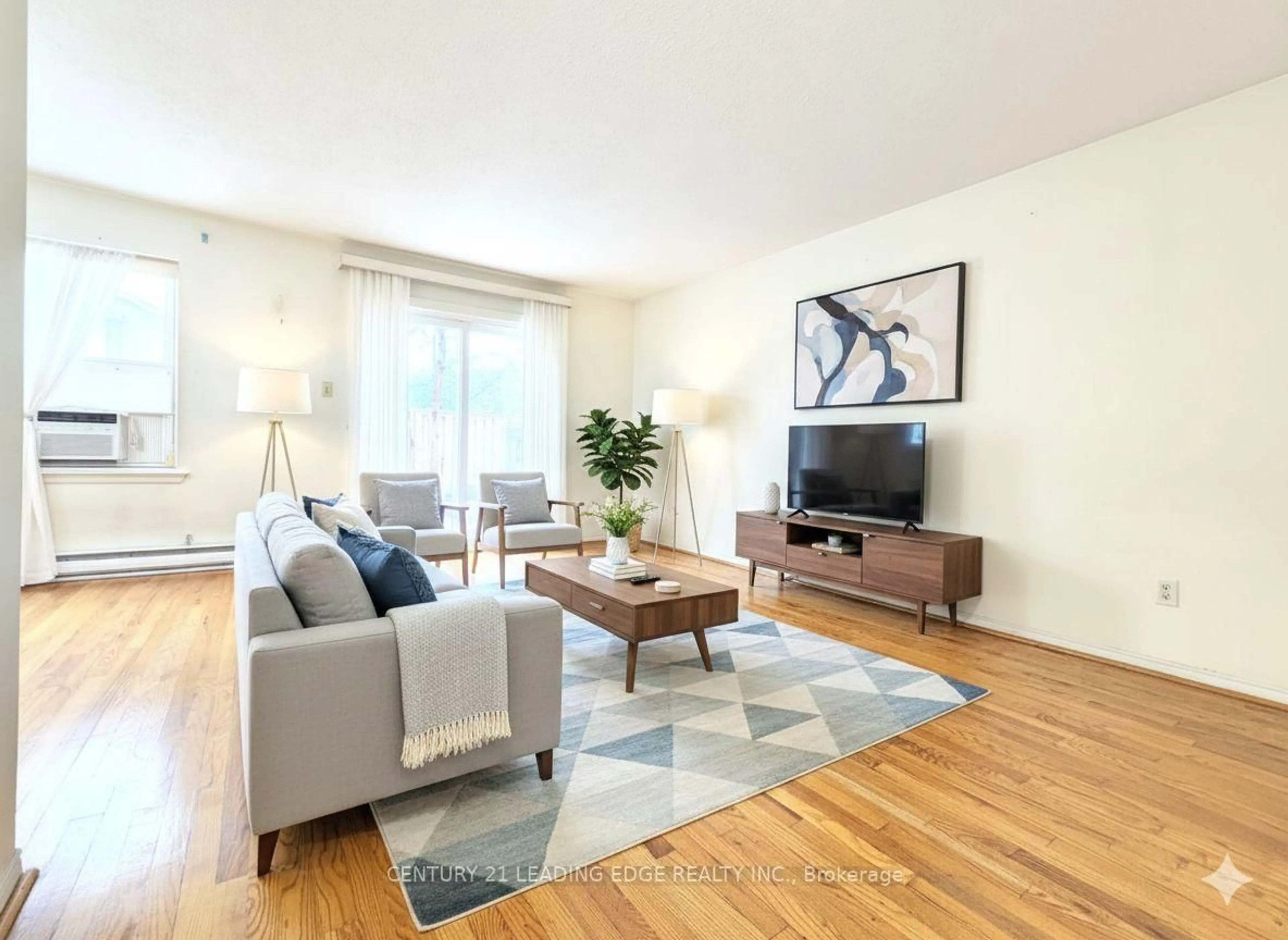 Living room with furniture, wood/laminate floor for 71 Cass Ave #63, Toronto Ontario M1T 3P8