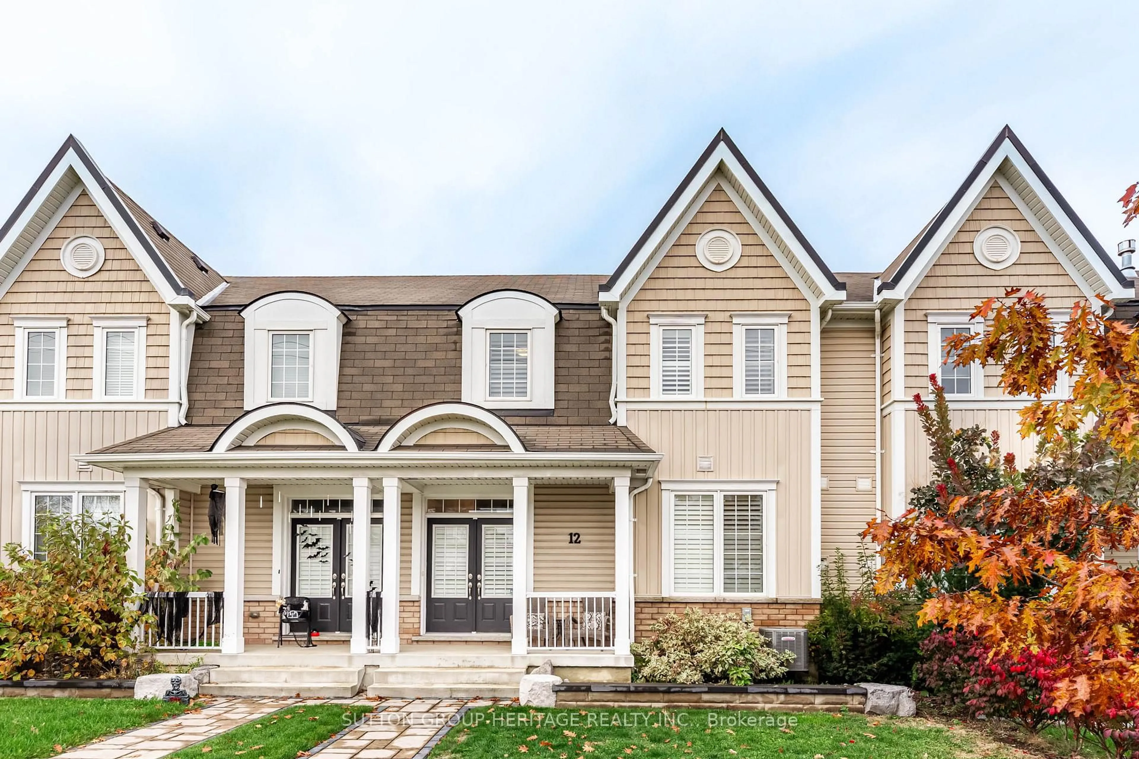 Home with vinyl exterior material, street for 12 Aller Park Way, Whitby Ontario L1M 0L5