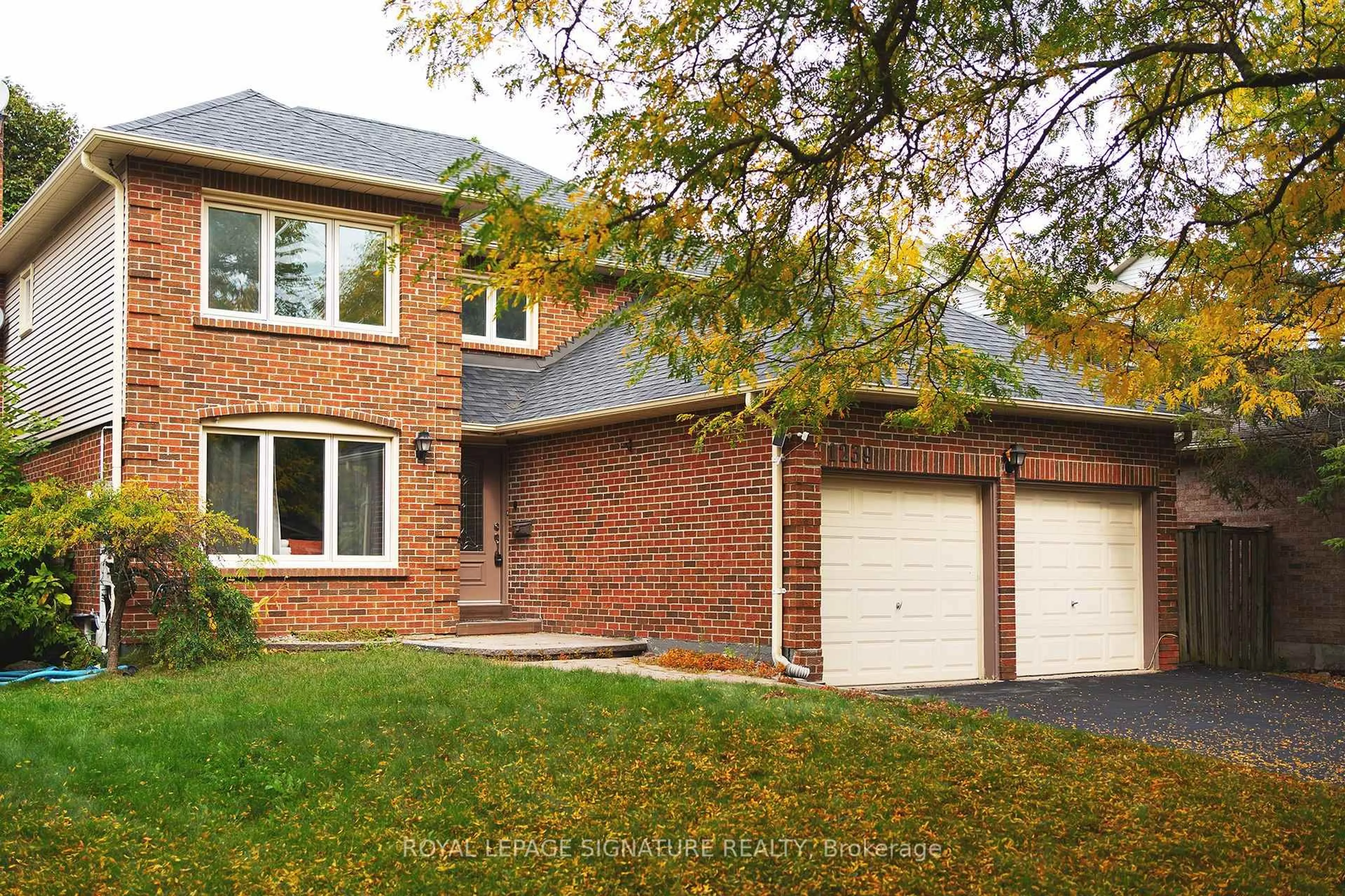 Home with brick exterior material, street for 1239 Barnwood Sq, Pickering Ontario L1X 1C6