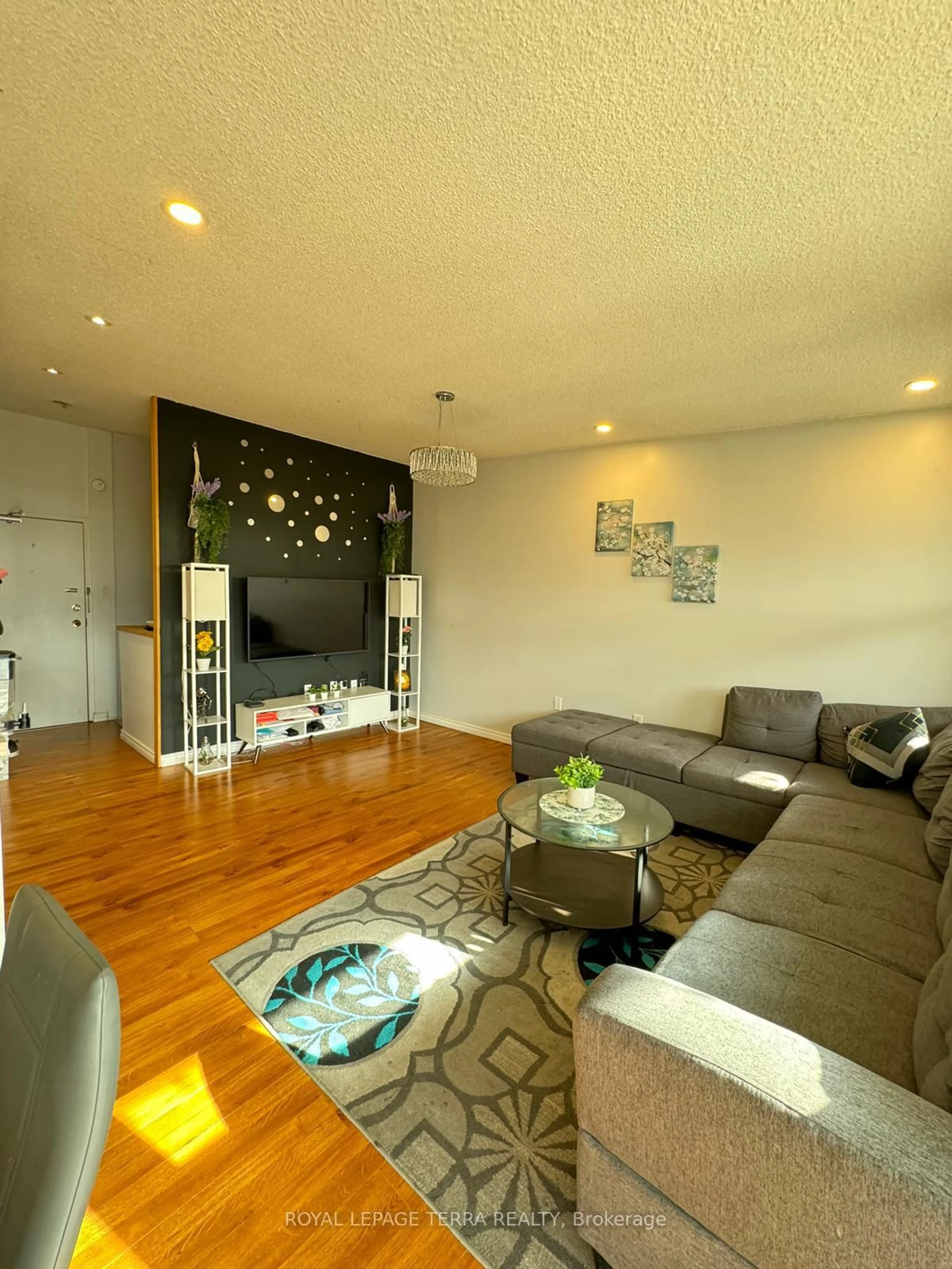 Living room with furniture, wood/laminate floor for 4064 Lawrence Ave #602, Toronto Ontario M1E 4V6