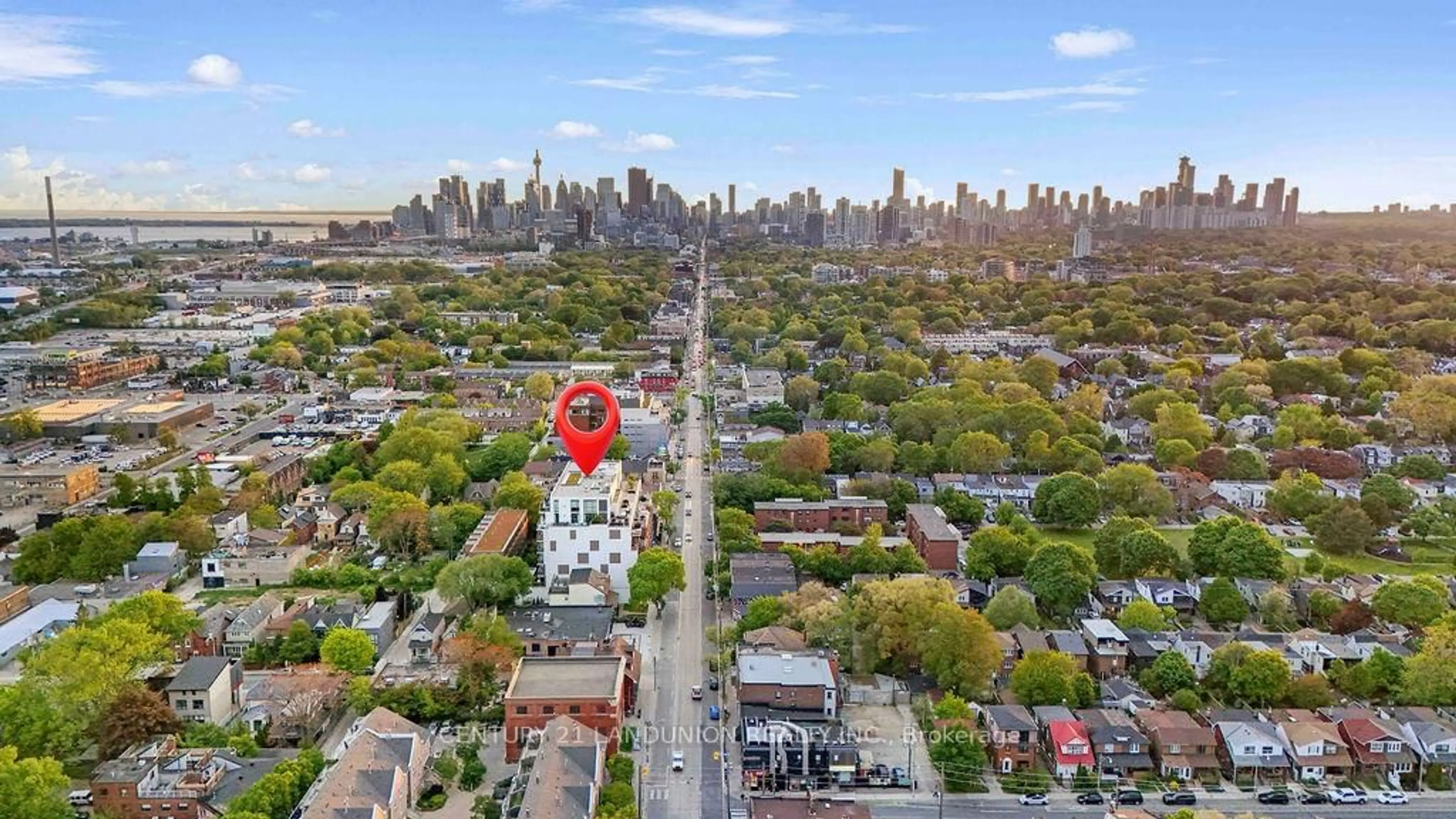 A pic from outside/outdoor area/front of a property/back of a property/a pic from drone, city buildings view from balcony for 1285 Queen St #512, Toronto Ontario M4L 1C2