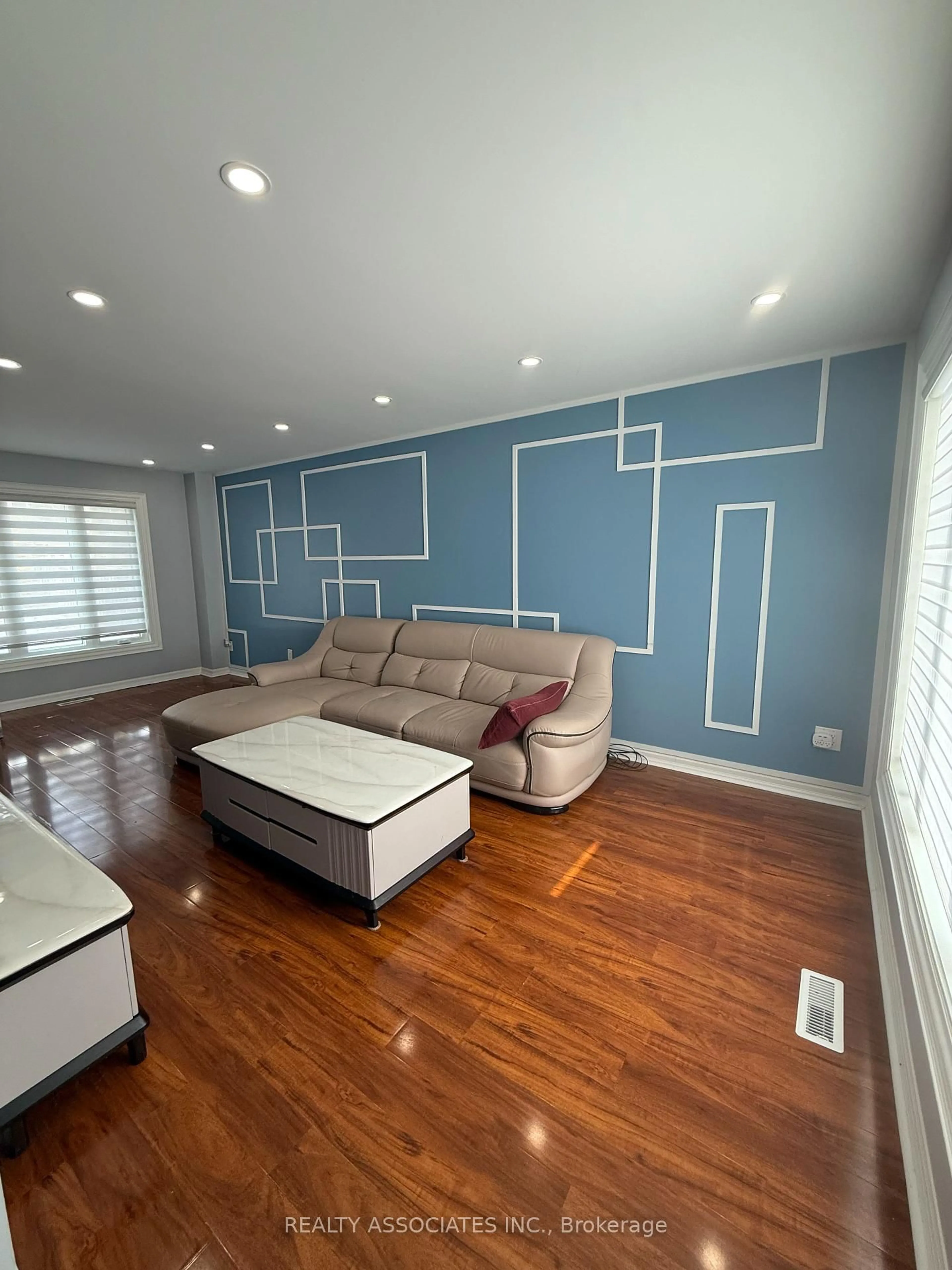 Living room with furniture, wood/laminate floor for 6 Harbord Cres, Ajax Ontario L1S 4E1