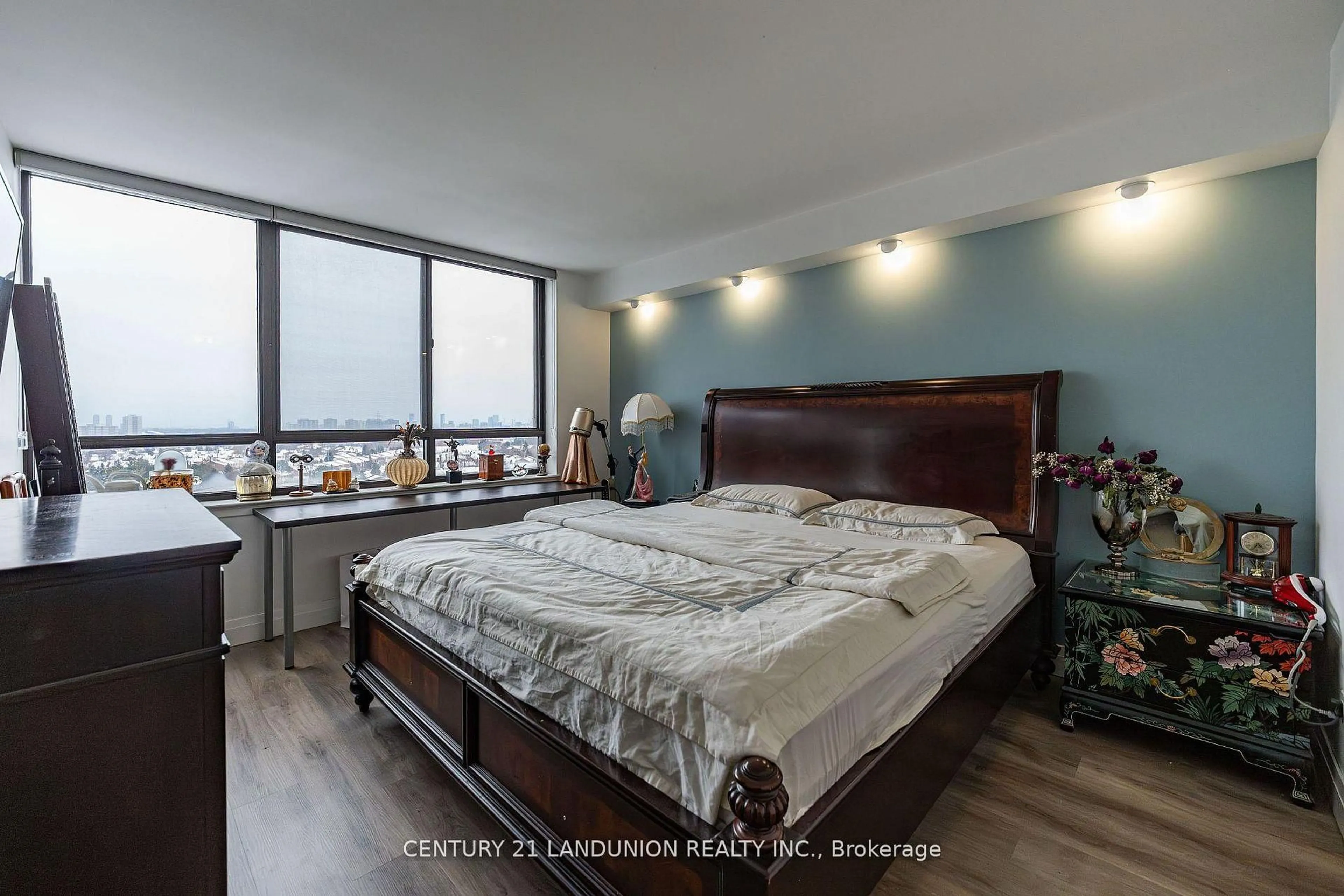 Bedroom with bed, wood/laminate floor for 55 Bamburgh Circ #1209, Toronto Ontario M1W 3V4