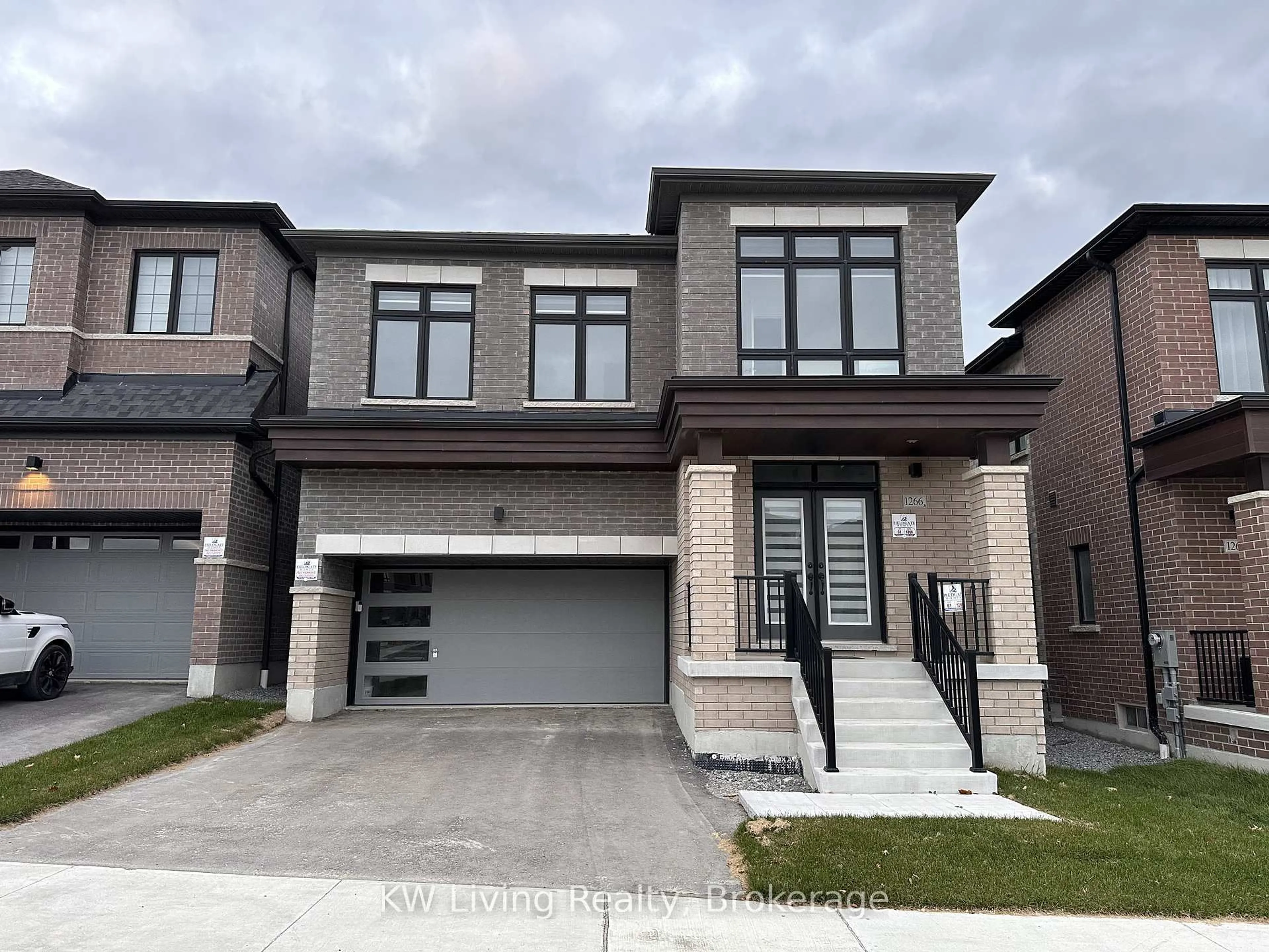 Home with brick exterior material, street for 1266 Talisman Manr, Pickering Ontario L1V 2P8