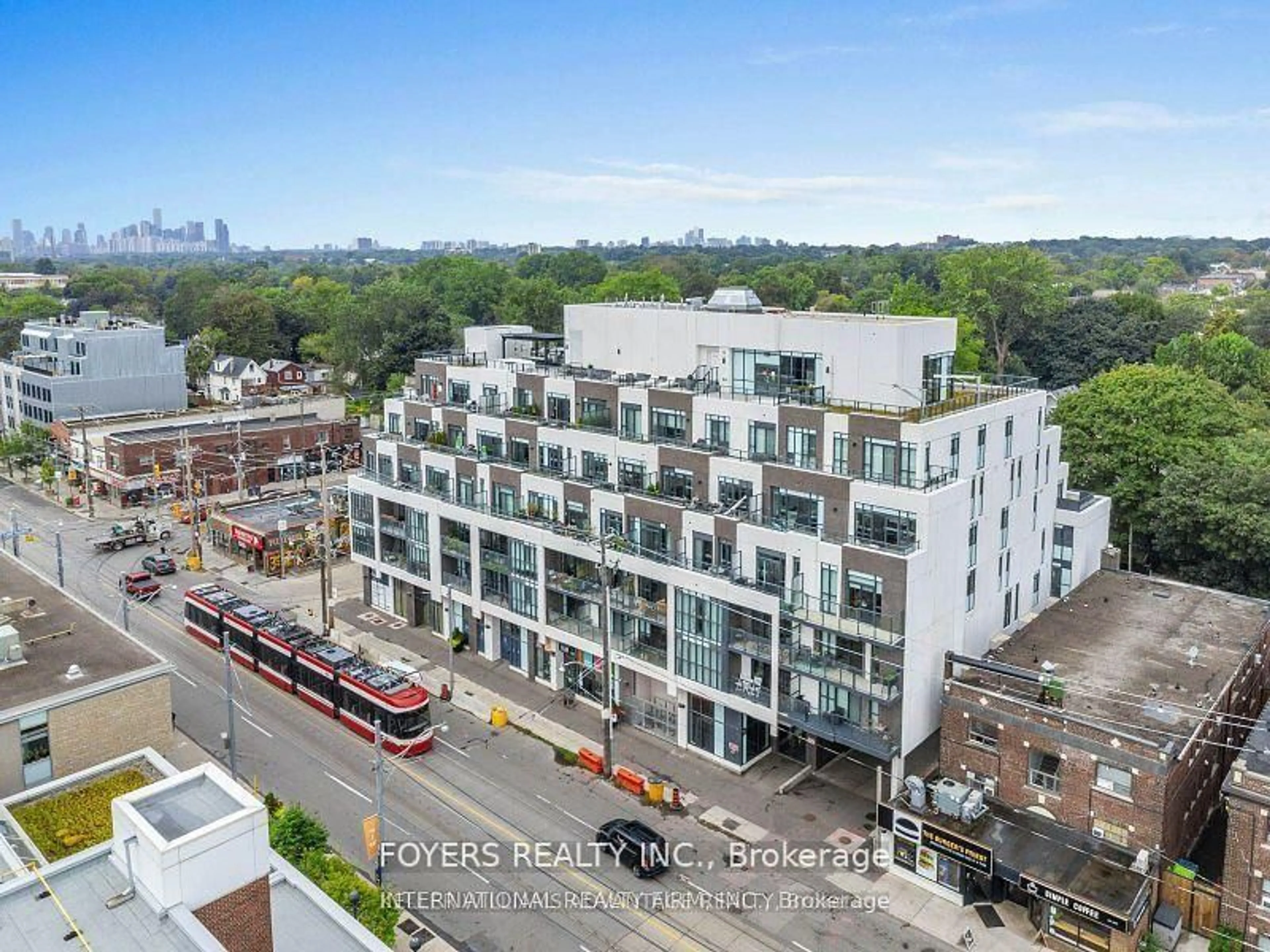 A pic from outside/outdoor area/front of a property/back of a property/a pic from drone, city buildings view from balcony for 1630 Queen St #314, Toronto Ontario M4L 1G3