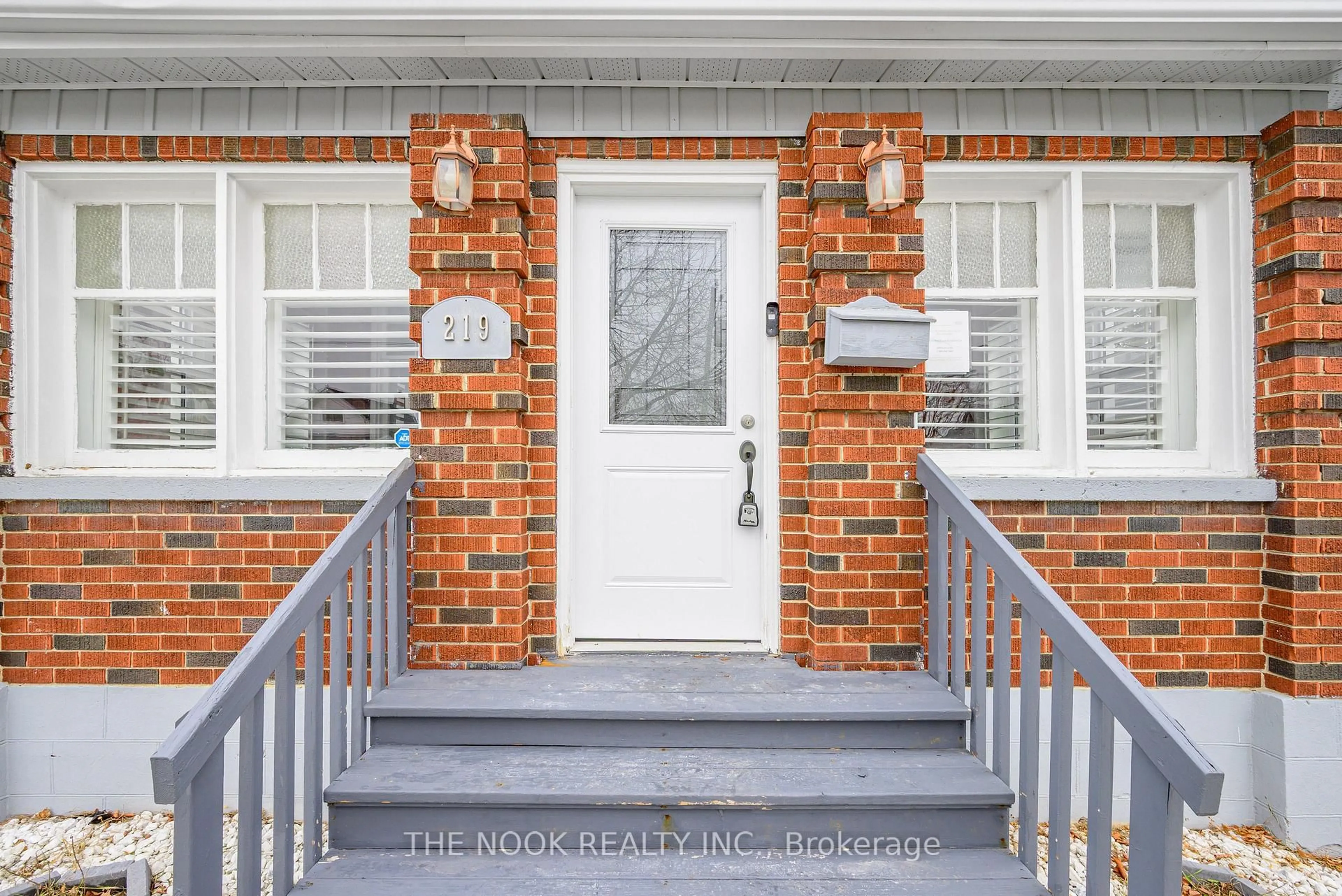 Home with brick exterior material, street for 219 Verdun Rd, Oshawa Ontario L1H 5T1