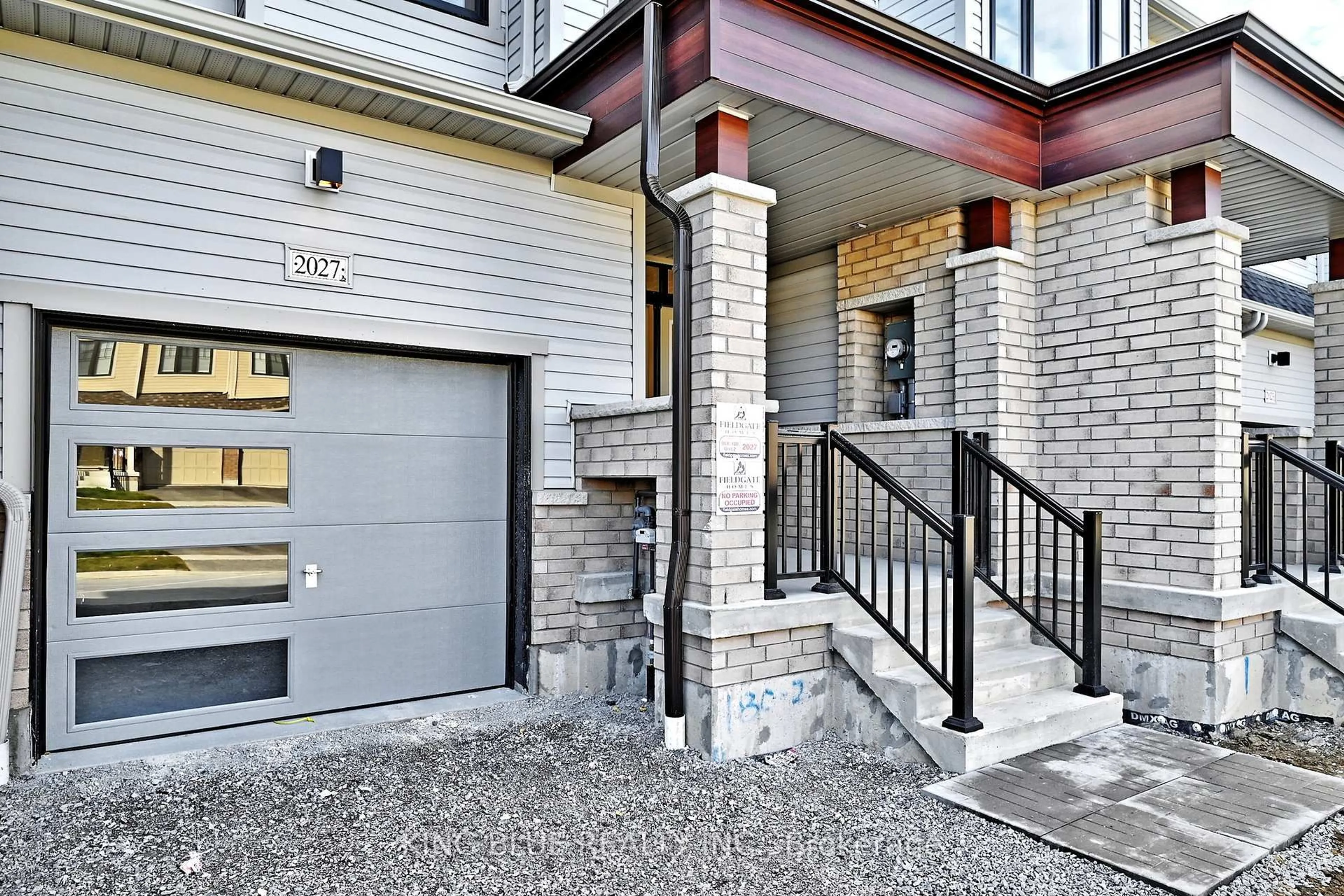 Home with brick exterior material, street for 2027 Horace Duncan Cres, Oshawa Ontario L1L 0W4