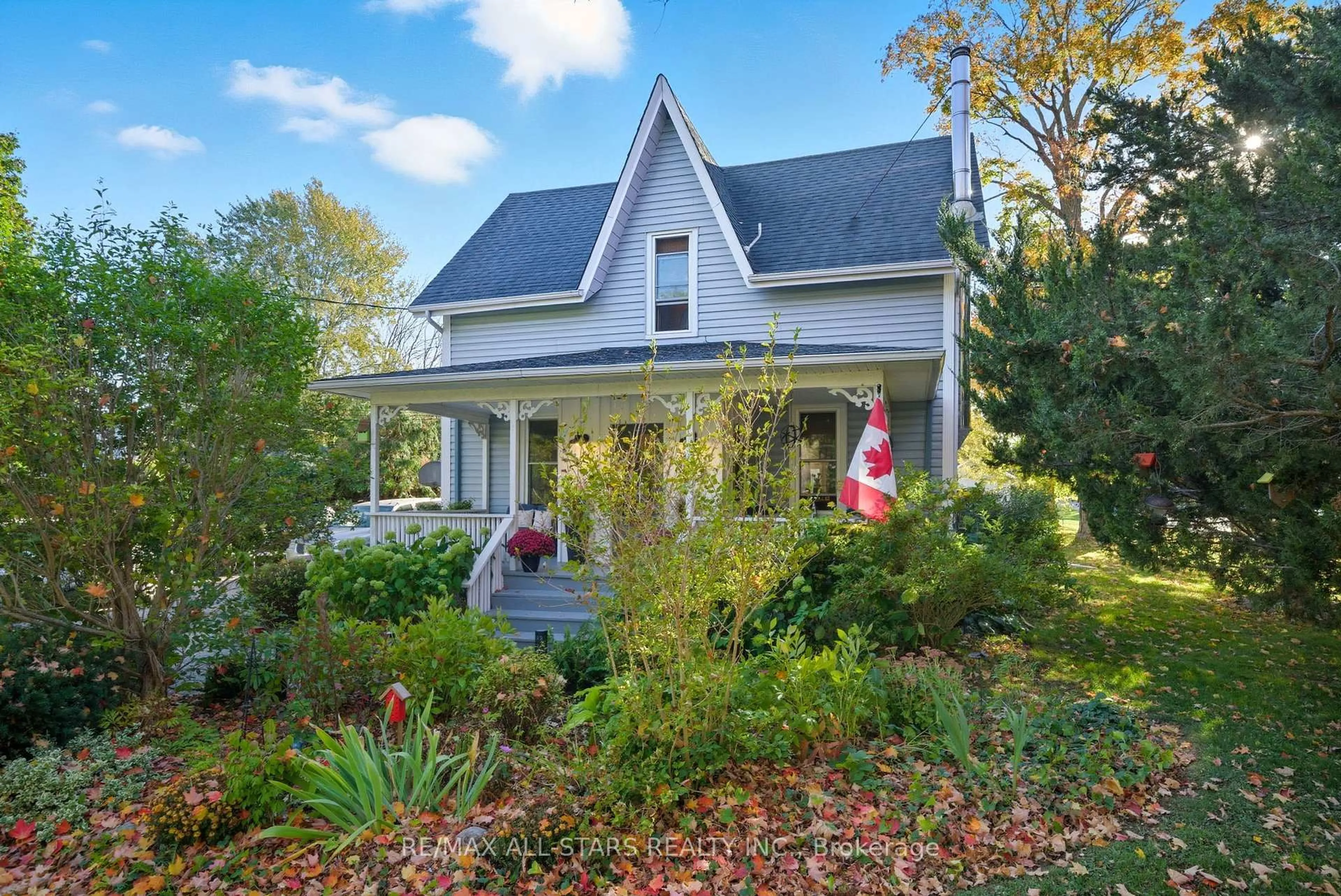 Home with vinyl exterior material, street for 20 Keene St, Scugog Ontario L0C 1G0