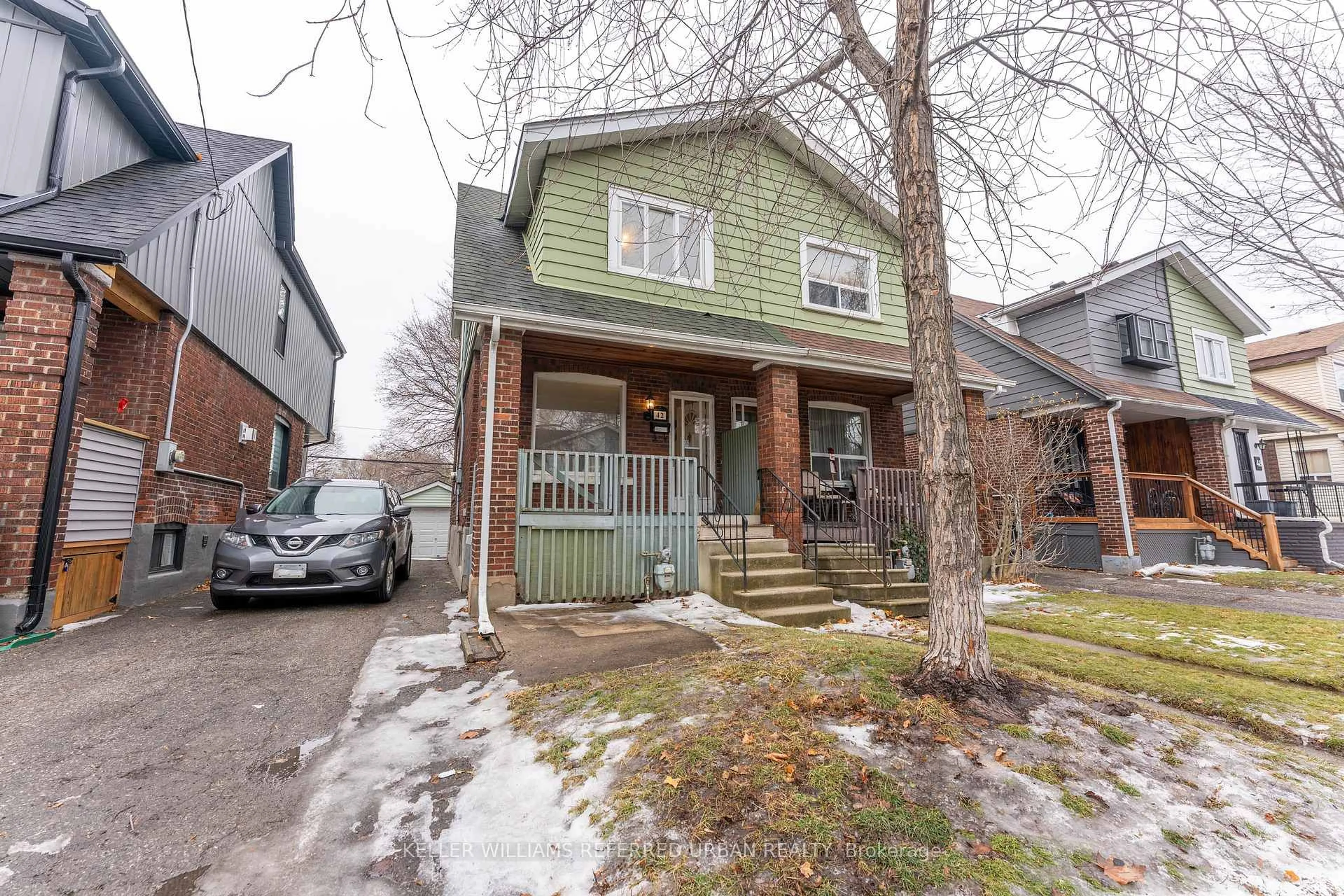 Home with brick exterior material, street for 42 Hiltz Ave, Toronto Ontario M4L 2N5