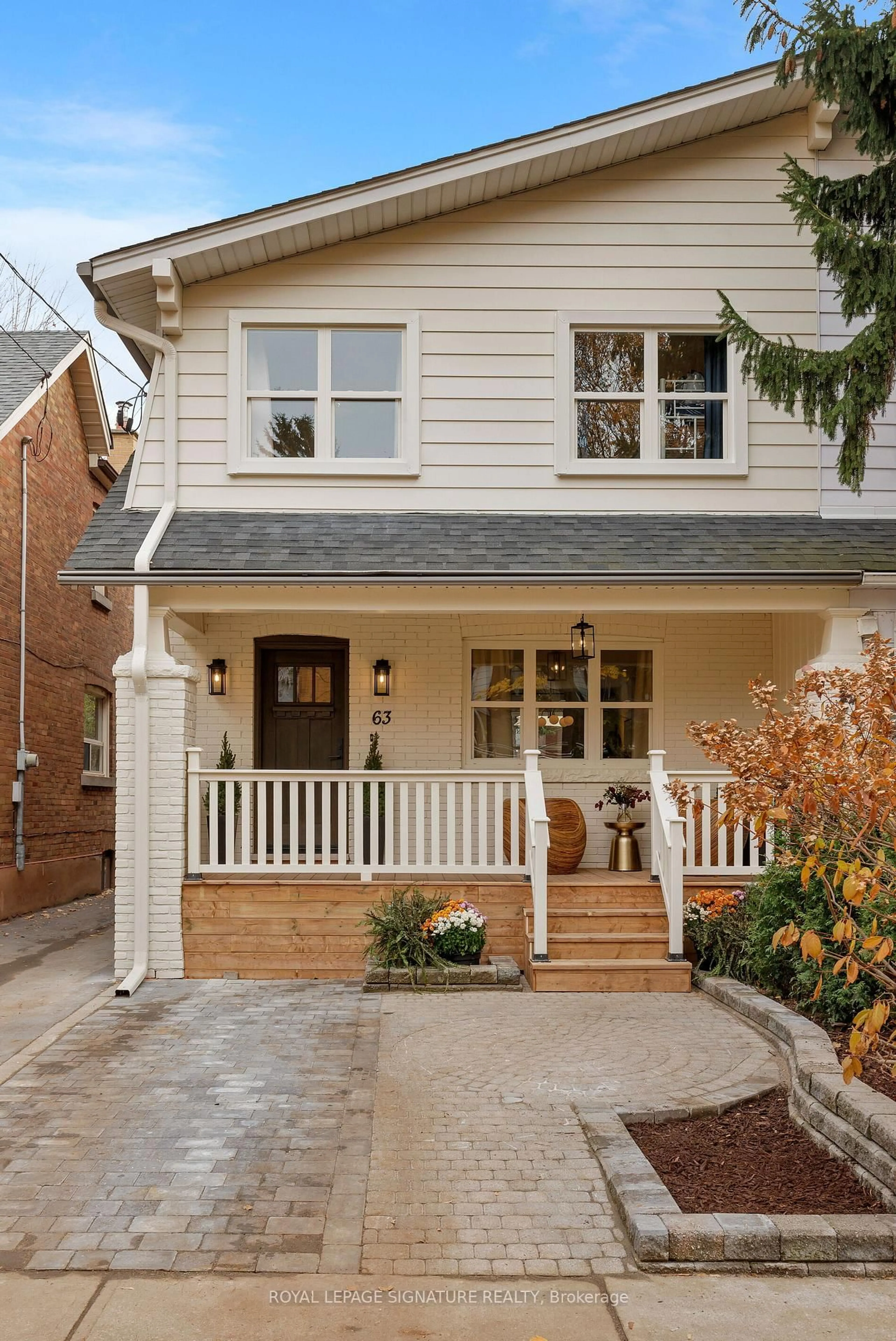 Home with brick exterior material, street for 63 Orchard Park Blvd, Toronto Ontario M4L 3E3