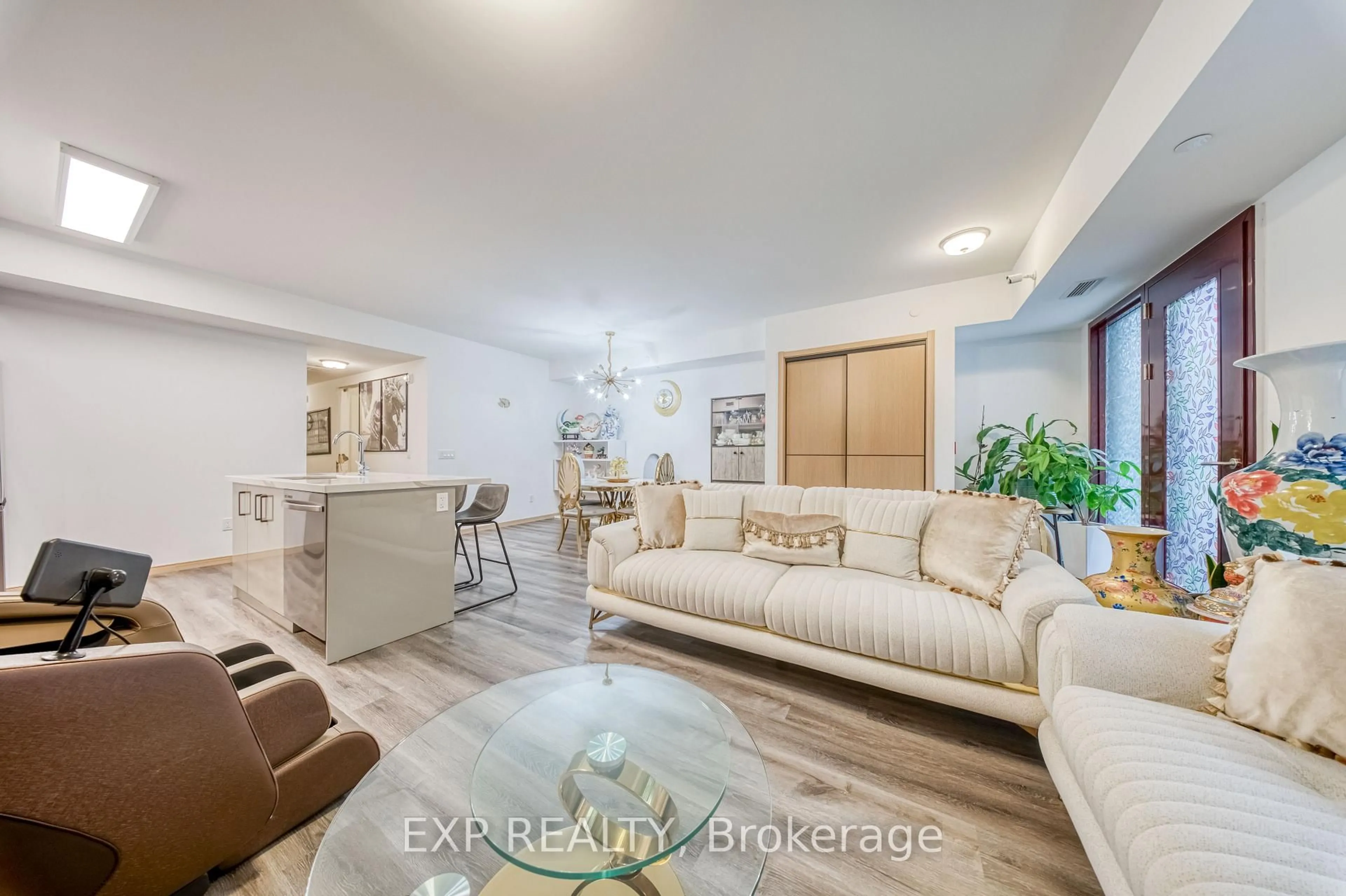 Living room with furniture, unknown for 50 Morecambe Gate #B107, Toronto Ontario M1W 0A9