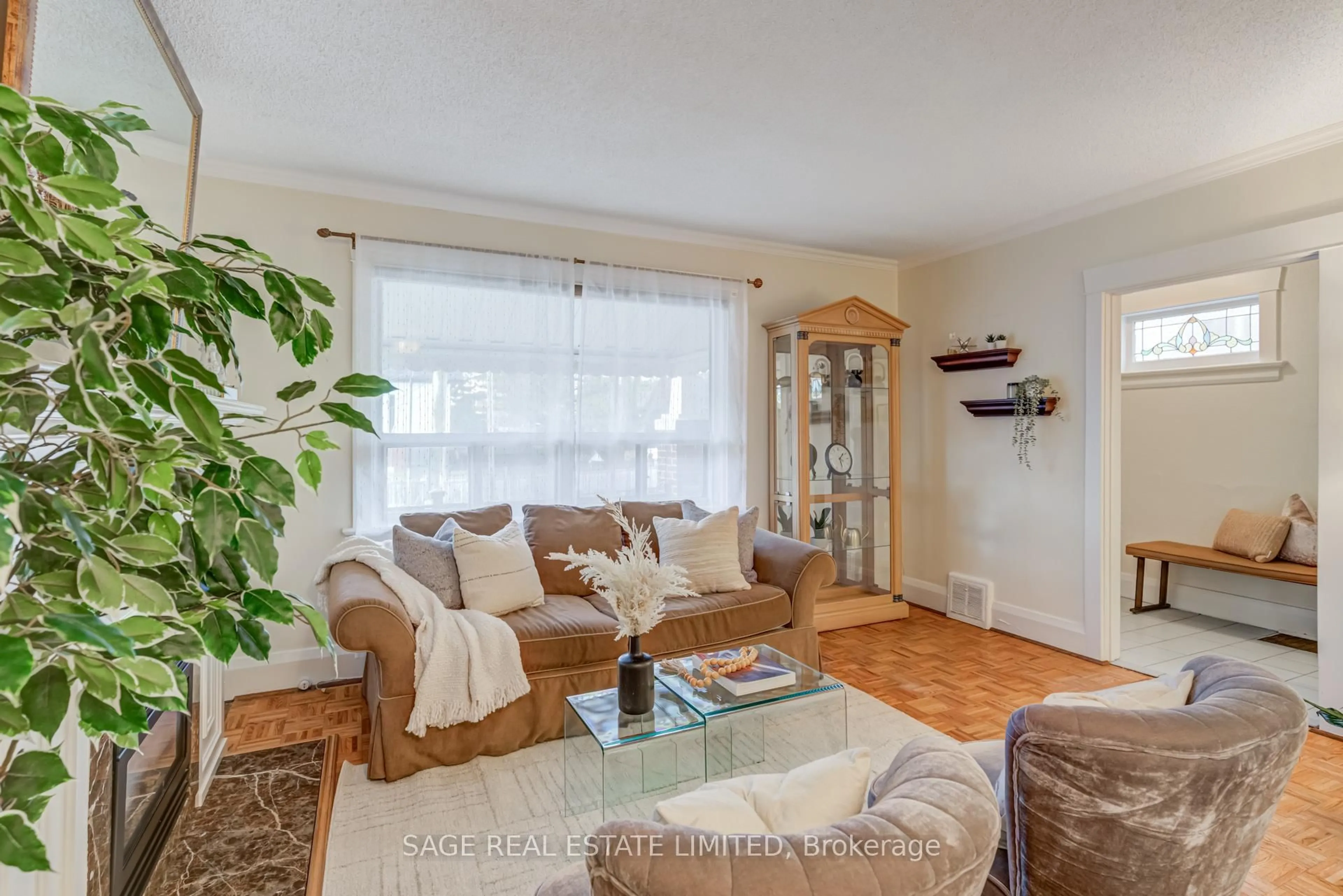 Living room with furniture, wood/laminate floor for 13 Patterson Ave, Toronto Ontario M1L 3Y1
