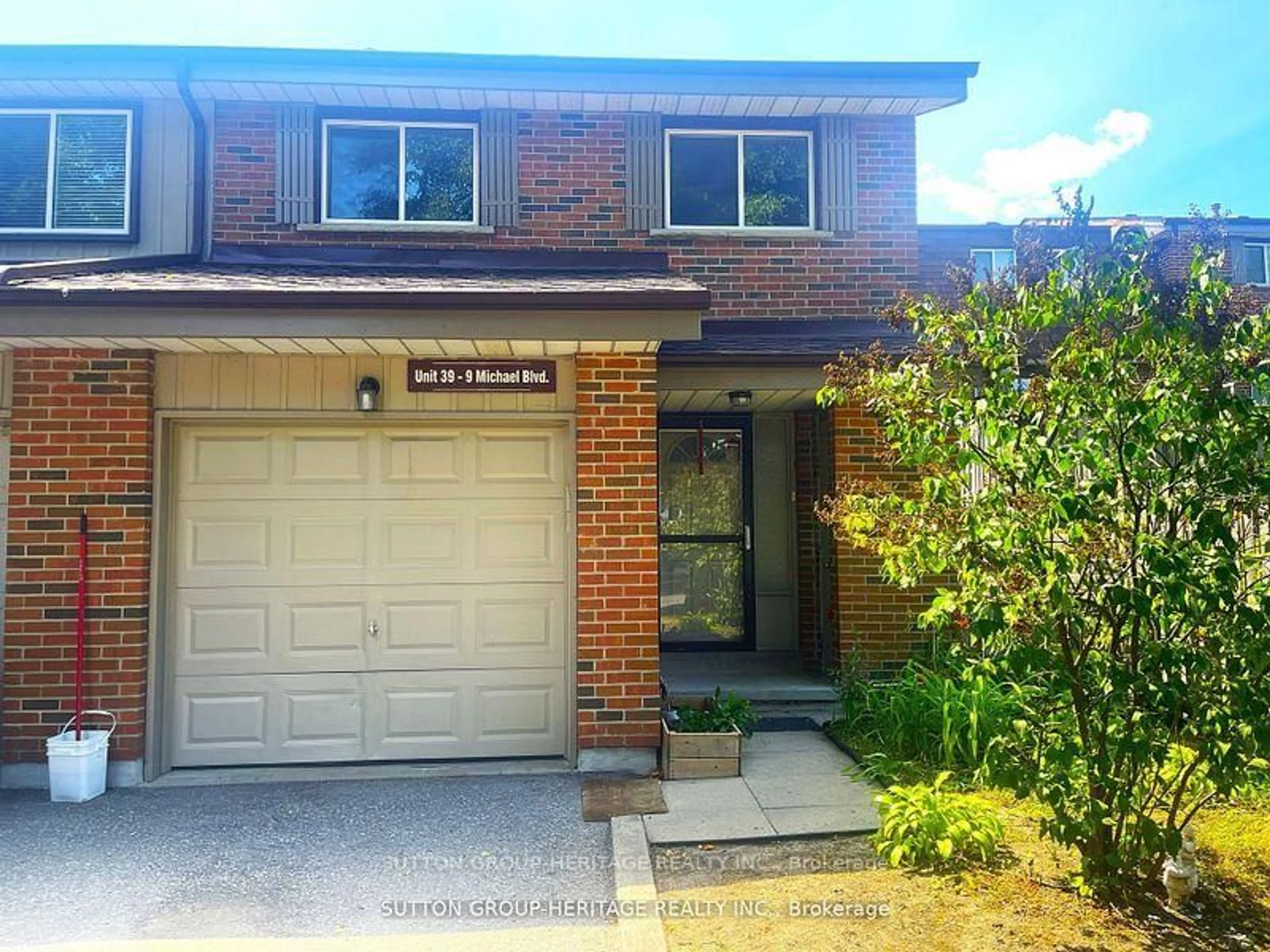 Home with brick exterior material, street for 9 Michael Blvd #39, Whitby Ontario L1N 5P4
